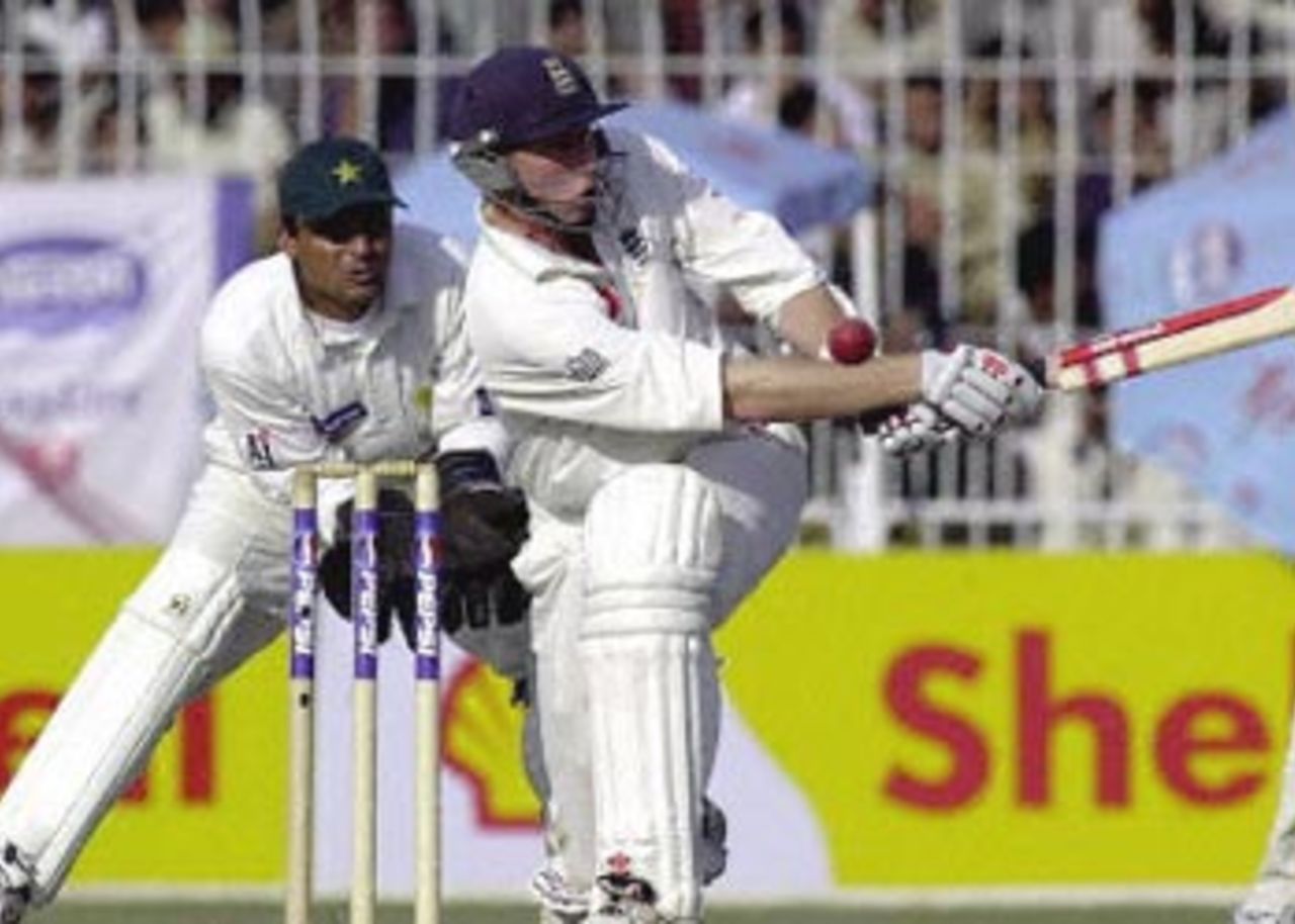 Moin Khan watches on as Mike Atherton attempts the sweep shot, England in Pakistan, 2000/01, 2nd Test, Pakistan v England, Iqbal Stadium, Faisalabad, 29Nov-03Dec 2000 (Day 5).