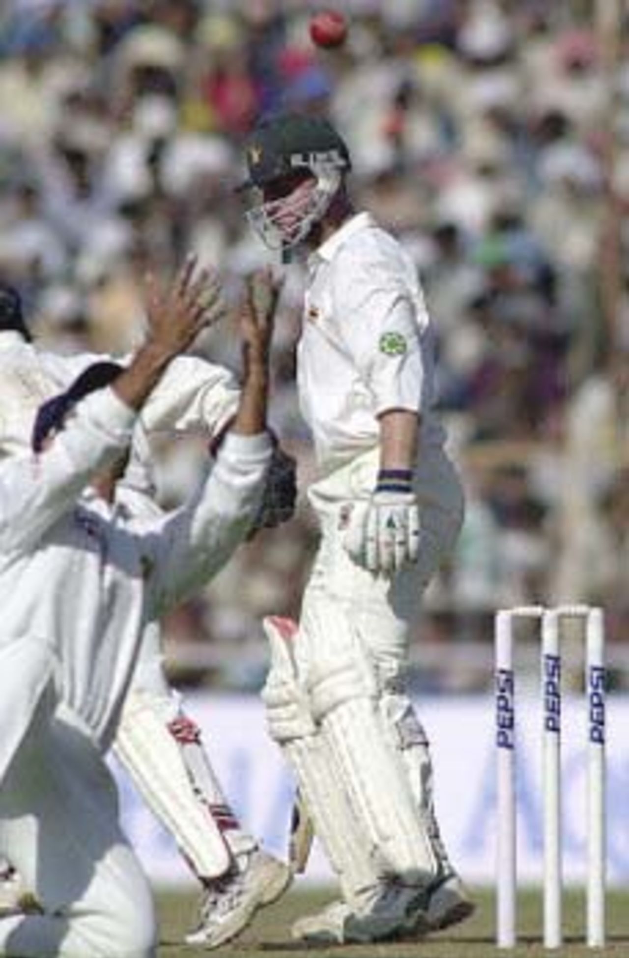 Rahul Dravid about to snap Alistair Campbell off Tendulkar, Zimbabwe in India, 2000/01, 2nd One-Day International, India v Zimbabwe, Sardar Patel (Gujarat) Stadium, Motera, Ahmedabad,  05 December 2000.