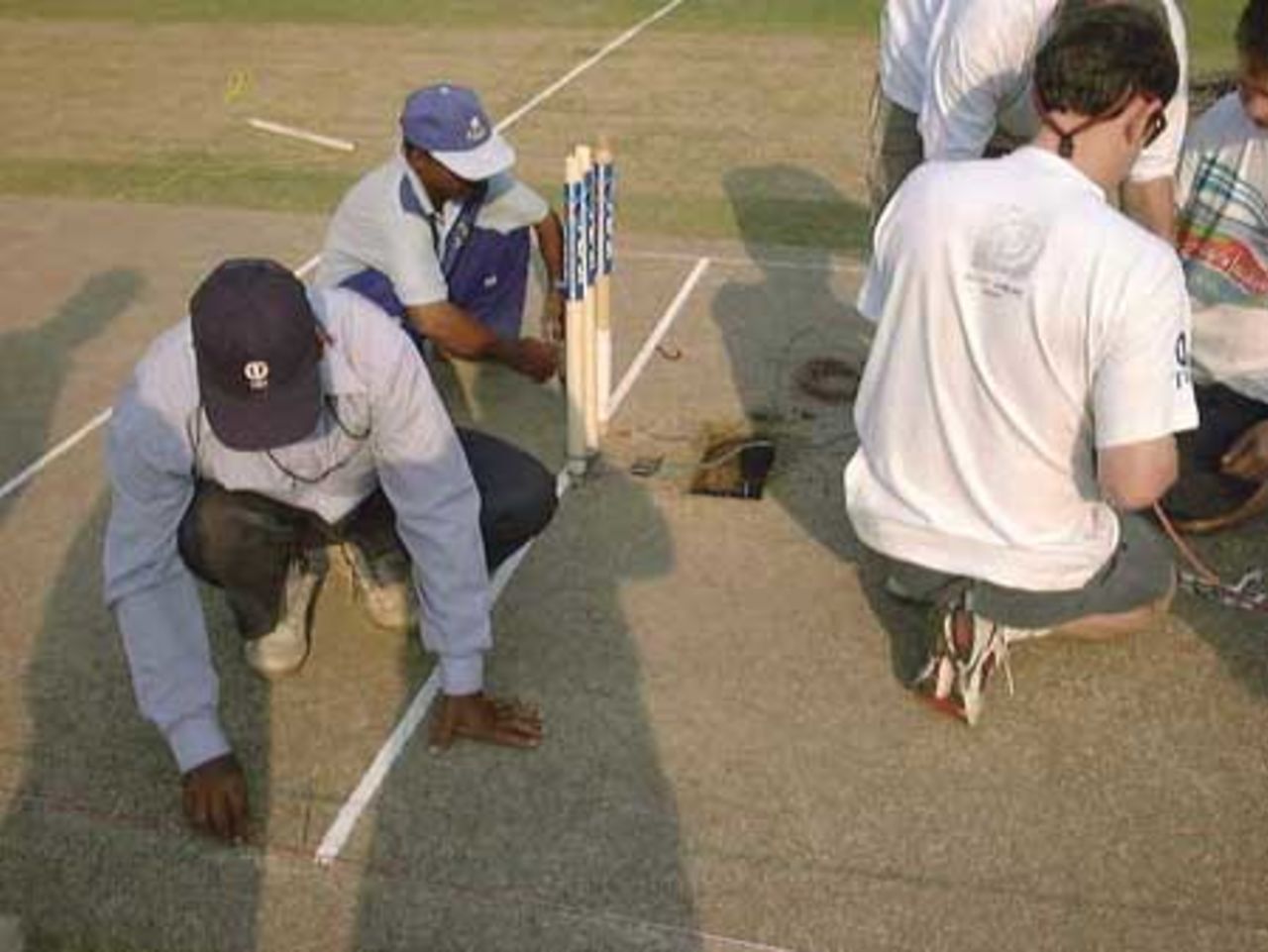 Final inspection in progress by groundsmen, 3rd Test Match, Pakistan v England at Karachi, 29 Nov-3 Dec 2000.