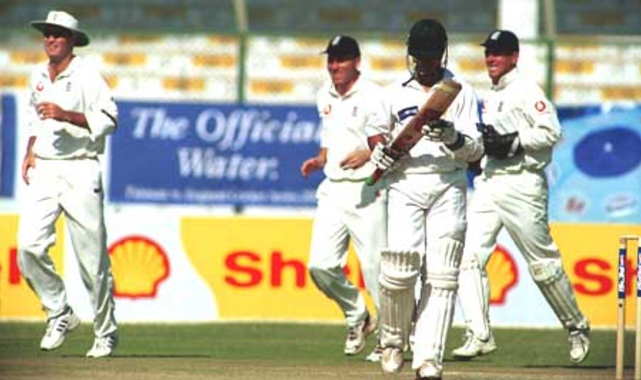 Imran Nazir on his way back to the pavilion as he is caught by Giles off Trescothick, Day 1, 3rd Test Match, Pakistan v England at Karachi, 7 Dec-11 Dec 2000.