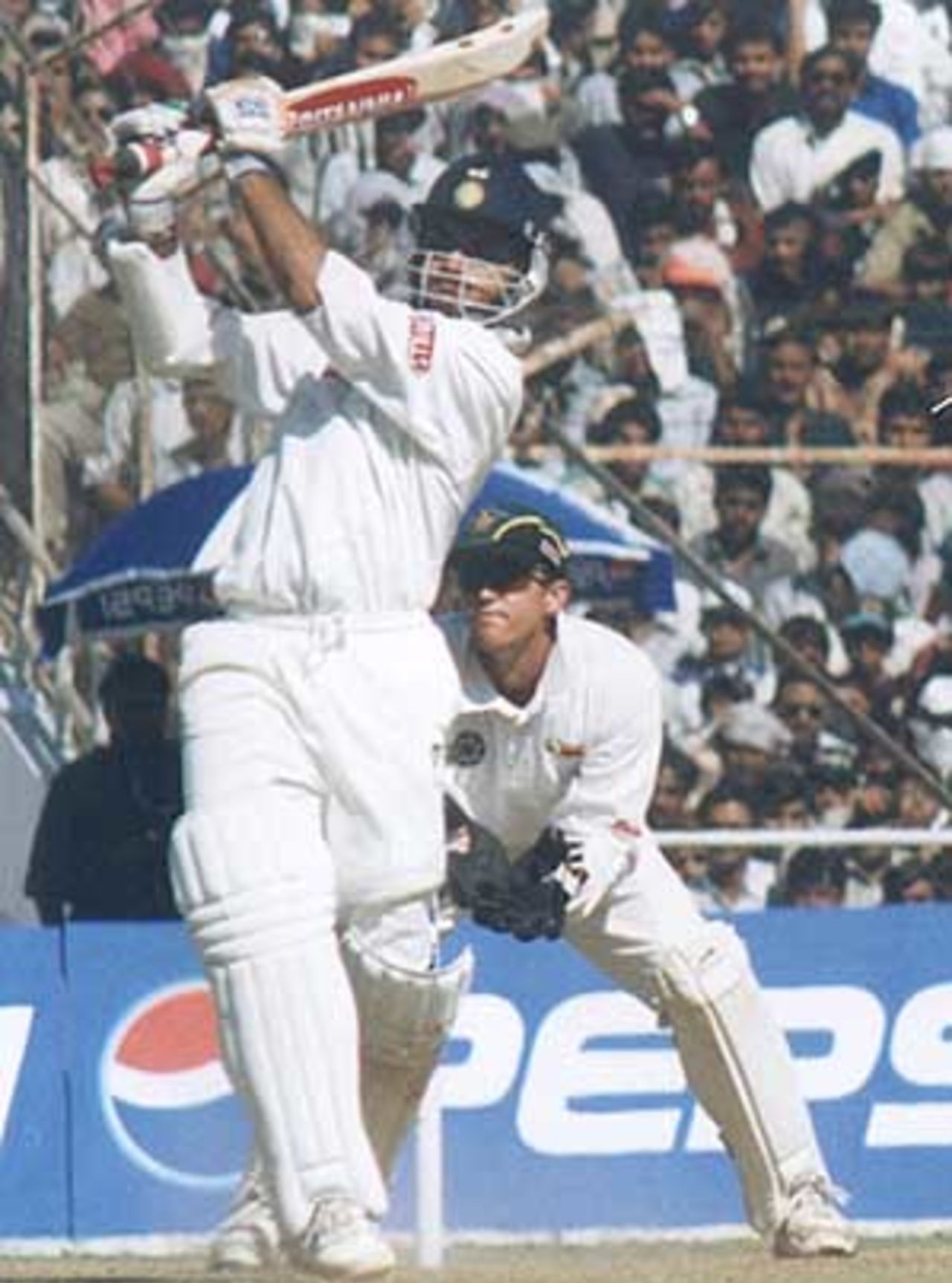 Sourav Ganguly lofts the ball for a six during his 144, Zimbabwe in India, 2000/01, 2nd One-Day International, India v Zimbabwe, Sardar Patel (Gujarat) Stadium, Motera, Ahmedabad, 05 December 2000.
