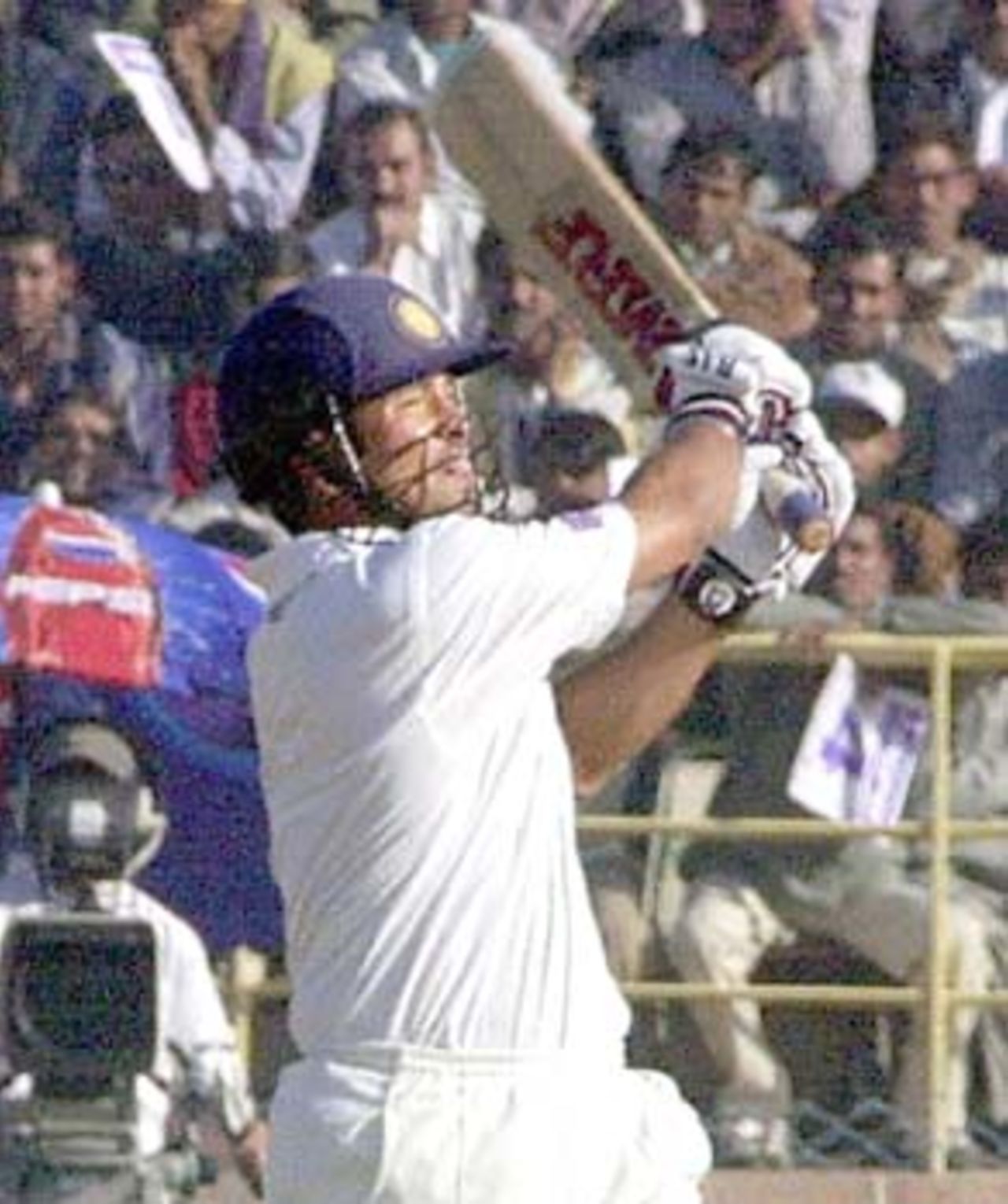 Indian ace Sachin Tendulkar hits a six off Zimbabwean bowler Travis Friend during the third one-day international cricket match in Jodhpur, 08 December 2000. Tendulkar hit 146 off 153 balls as India piled up 283-8 from 50 overs in the match against Zimbabwe.