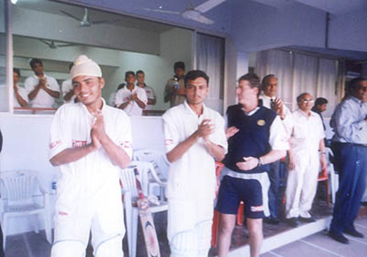 The Indian dressing room congratulate Ganguly on his century, Zimbabwe in India, 2000/01, 2nd One-Day International, India v Zimbabwe, Sardar Patel (Gujarat) Stadium, Motera, Ahmedabad, 05 December 2000.
