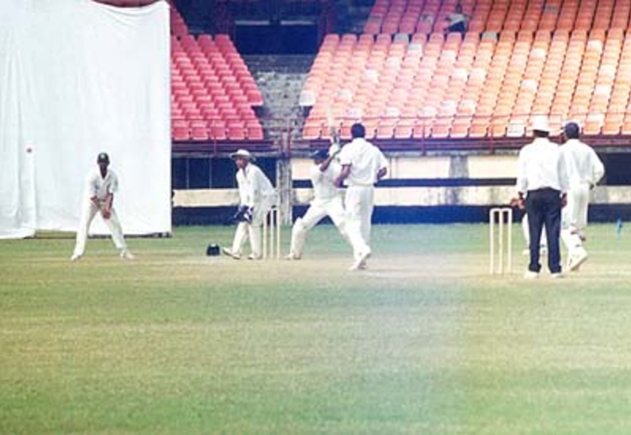 Dharmichand being square cut by S oasis for a boundary. Ranji Trophy South Zone League 2000/01, Kerala v Karnataka, Nehru Stadium, Kochi, 22-25 November 2000