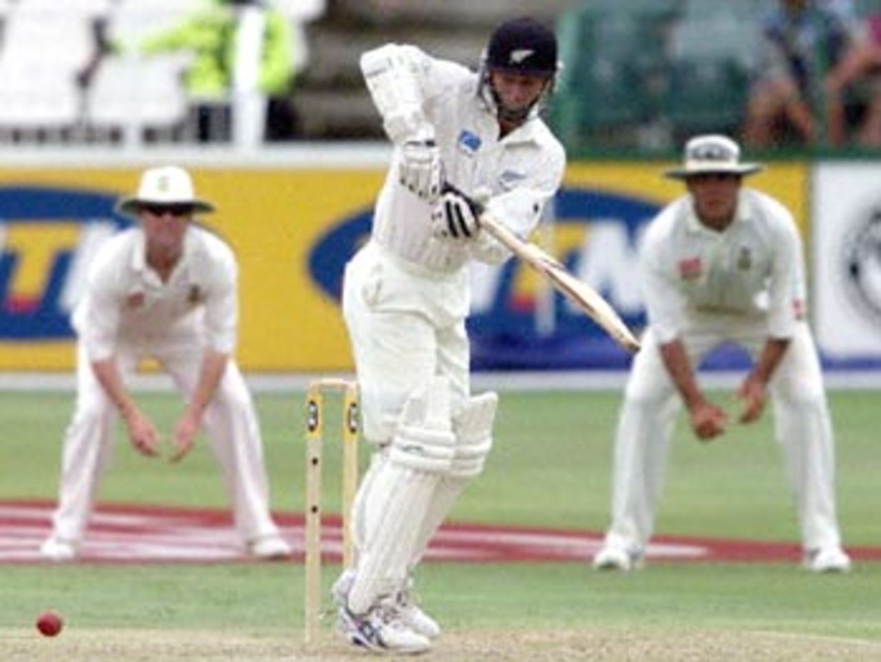 New Zealand's batsman Mark Richardson stops a fast ball 09 December 2000 , during the second day of the third and last five day cricket test between the two countries , at the Wanderers cricket grounds in Johannesburg.