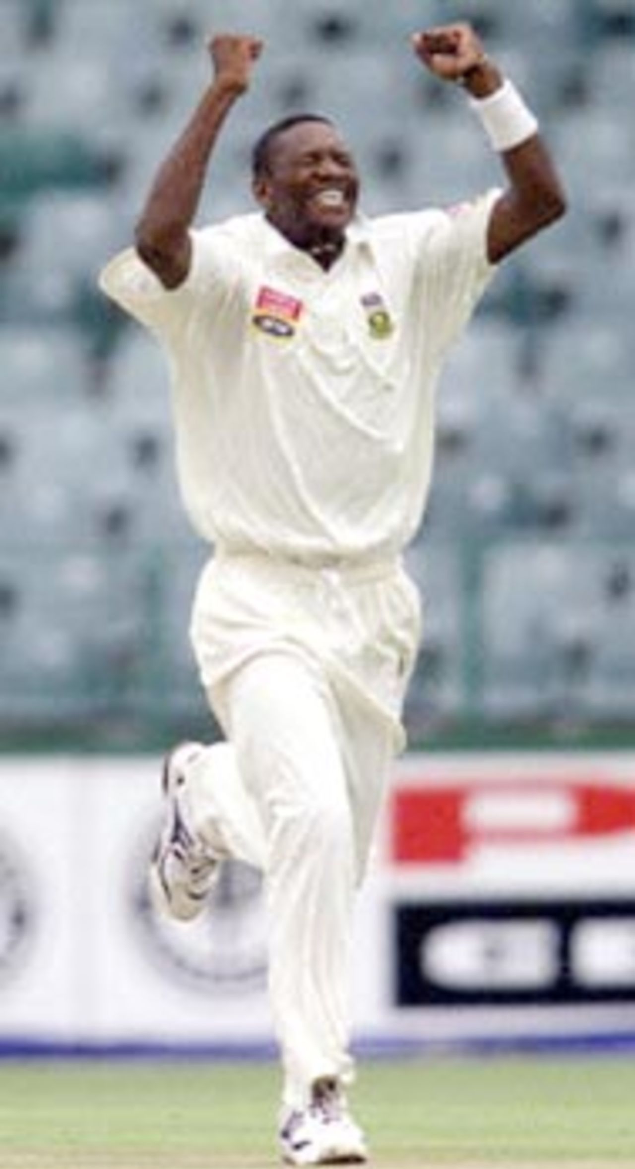 South African fast bowler Mfuneko Ngam reacts 09 December 2000 after sending out New Zealand's Adam Parore, during the second day of the third and last five day cricket test between the two countries, at the Wanderers cricket grounds in Johannesburg.