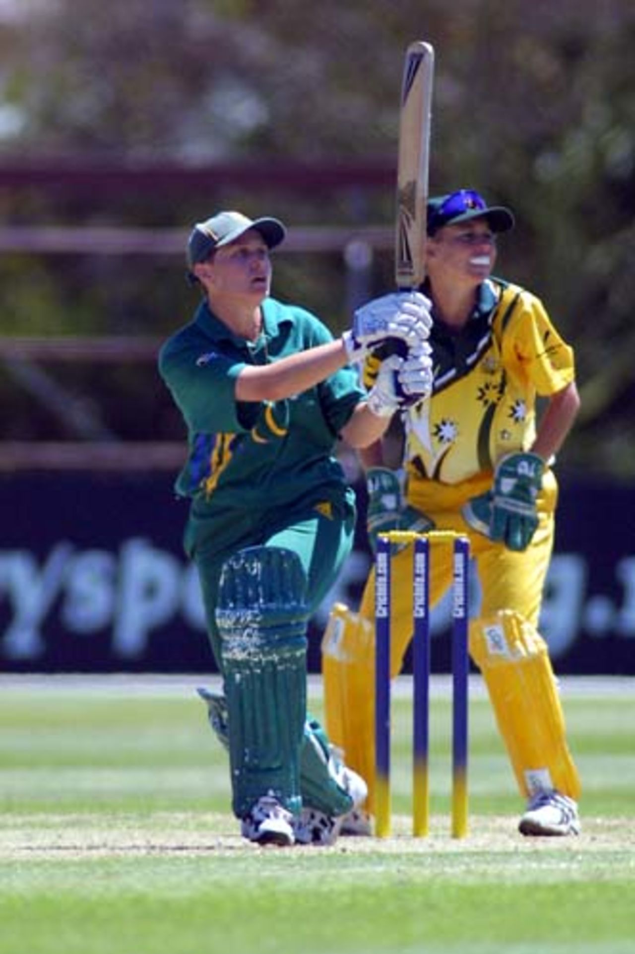 Australian team gather after another South African wicket