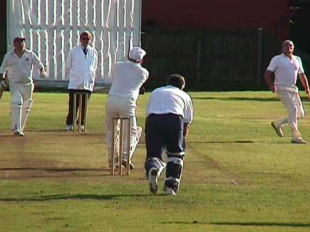 Alven Burrows lofts Hyndburn West's Martin Coy into the outfield in the ADCL Veterans Final at New Lane