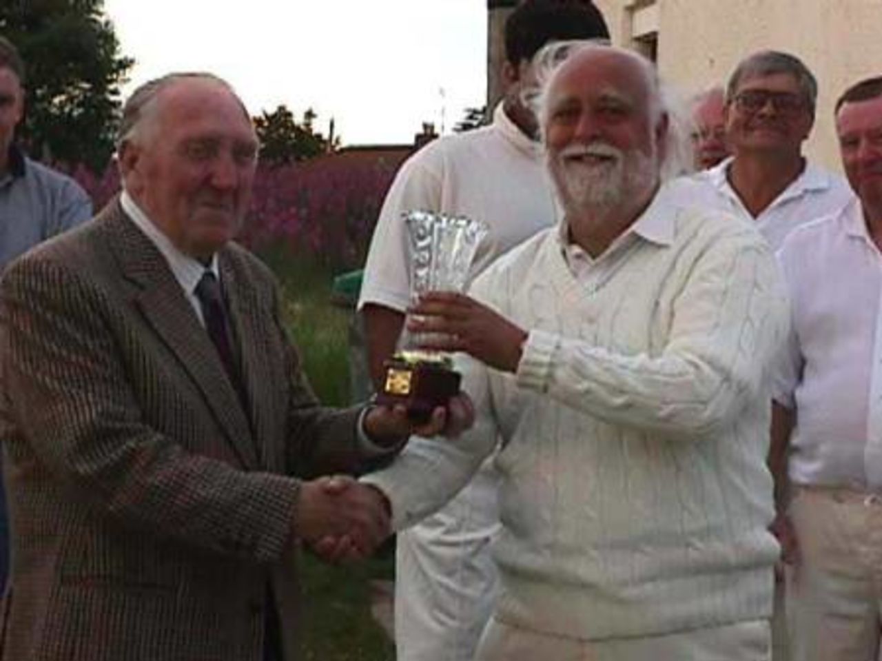 Accrington 4th XI captain Ian Ormerod receives the ADCL Veterans trophy from President Jack Hartley
