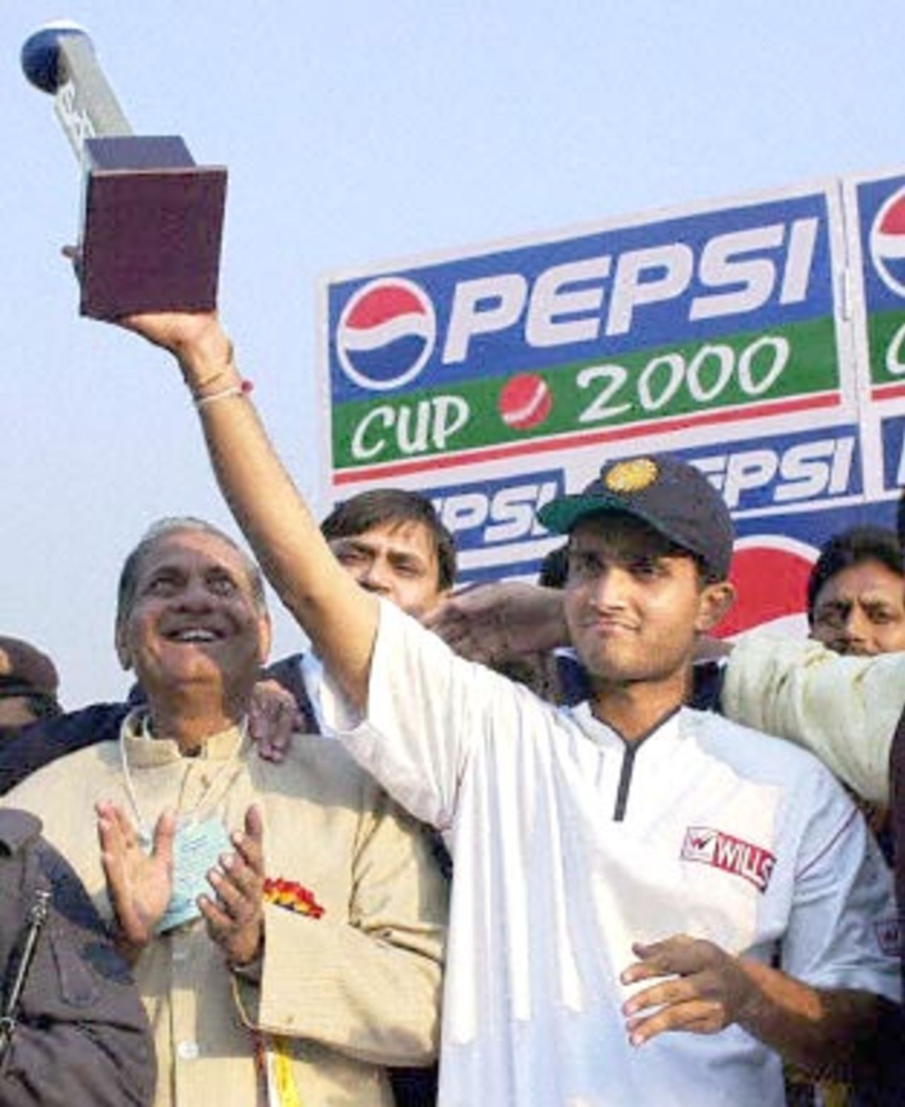 Indian skipper Saurav Ganguly holds his man-of-the-match trophy in Green Park ground in Kanpur, 11 December 2000. Ganguly claimed a career-best 5-35 and then hit an unbeaten 71 off 68 balls as India dumped Zimbabwe by nine wickets to win the one-day series.