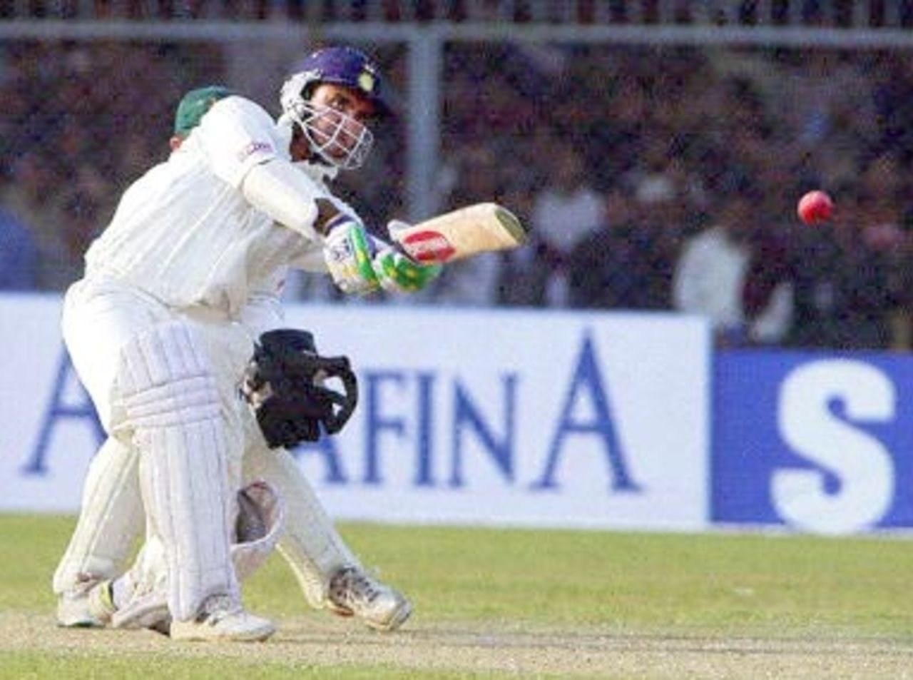 Indian skipper Saurav Ganguly hits a ball to boundary during the fourth one-day cricket match against Zimbabwe in Kanpur, 11 December 2000. India won the match by nine wicket to take the series.