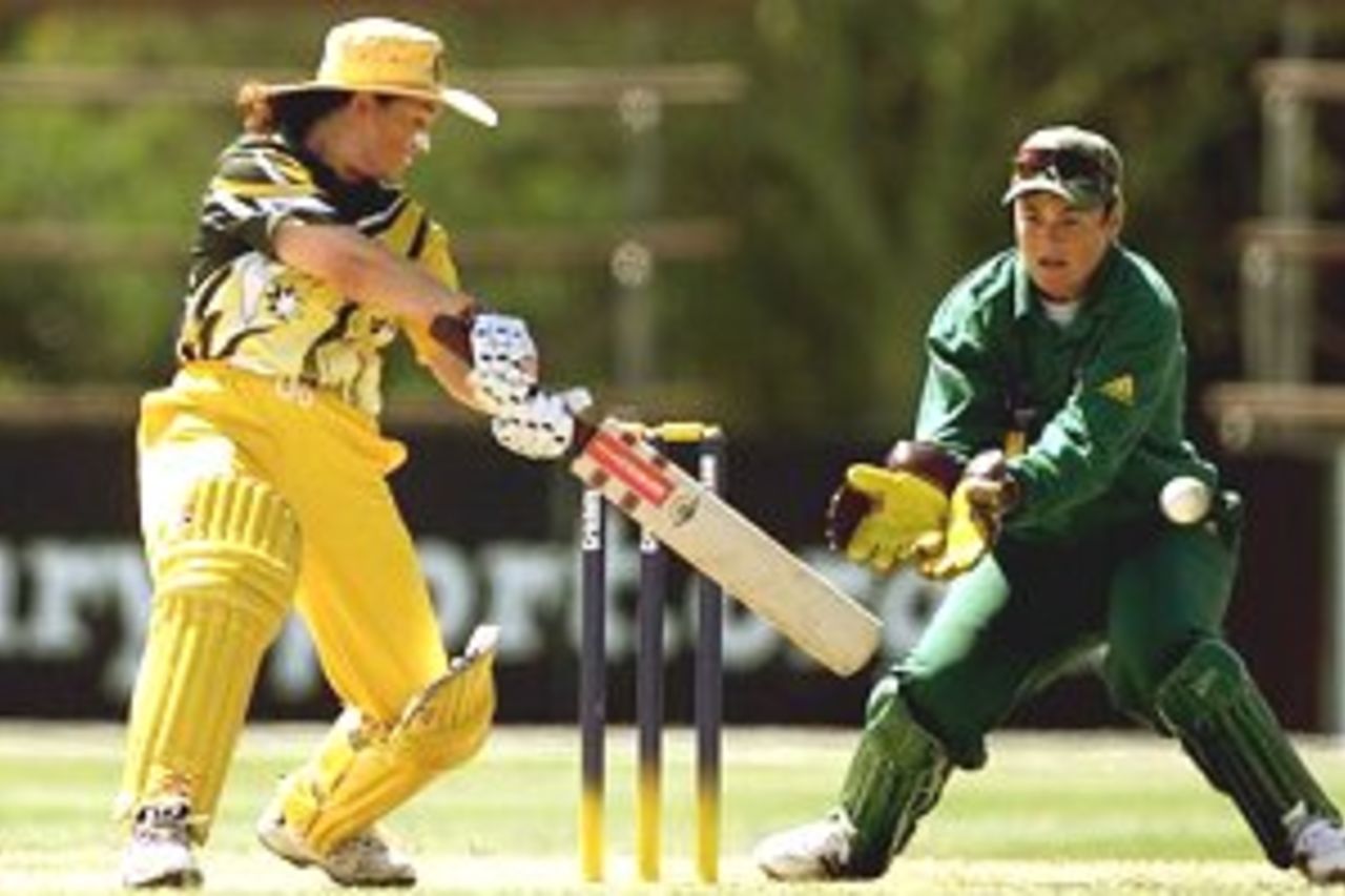 13 Dec 2000: Karen Rolton of Australia in action whilst scoring 107 not out as South African wicketkeeper Daleen Terblanche looks on during the Australia v South Africa match in the 2000 CricInfo Womens Cricket World Cup match played at BIL Oval, Lincoln, New Zealand. Australia defeated South Africa by 9 wickets.