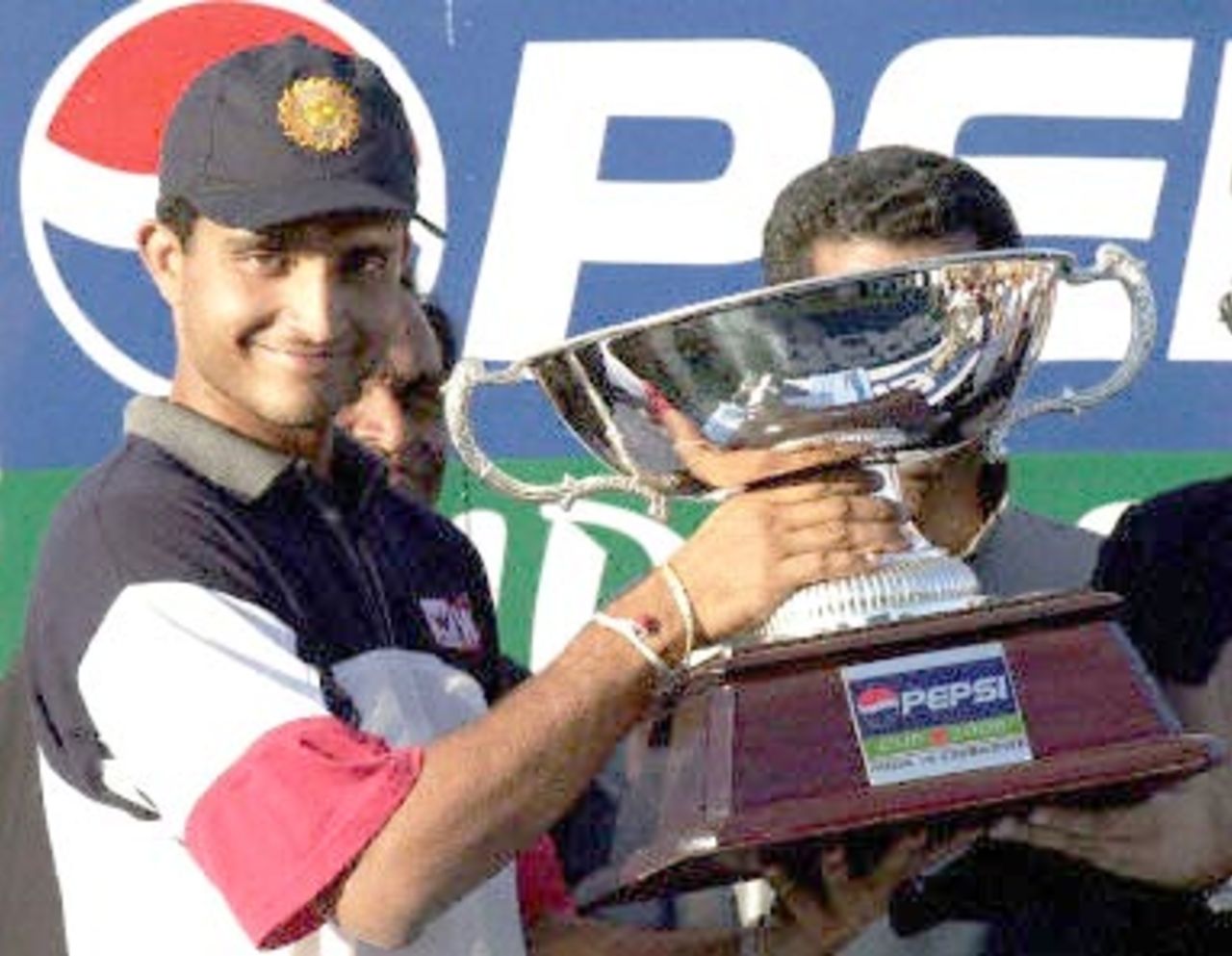 Indian skipper Sourav Ganguly shows the winner's trophy after India won the final match and the series against Zimbabwe, 14 December 2000 at the Municipal ground in Rajkot. Ganguly was banned from the match for on-field behavior in the last match.