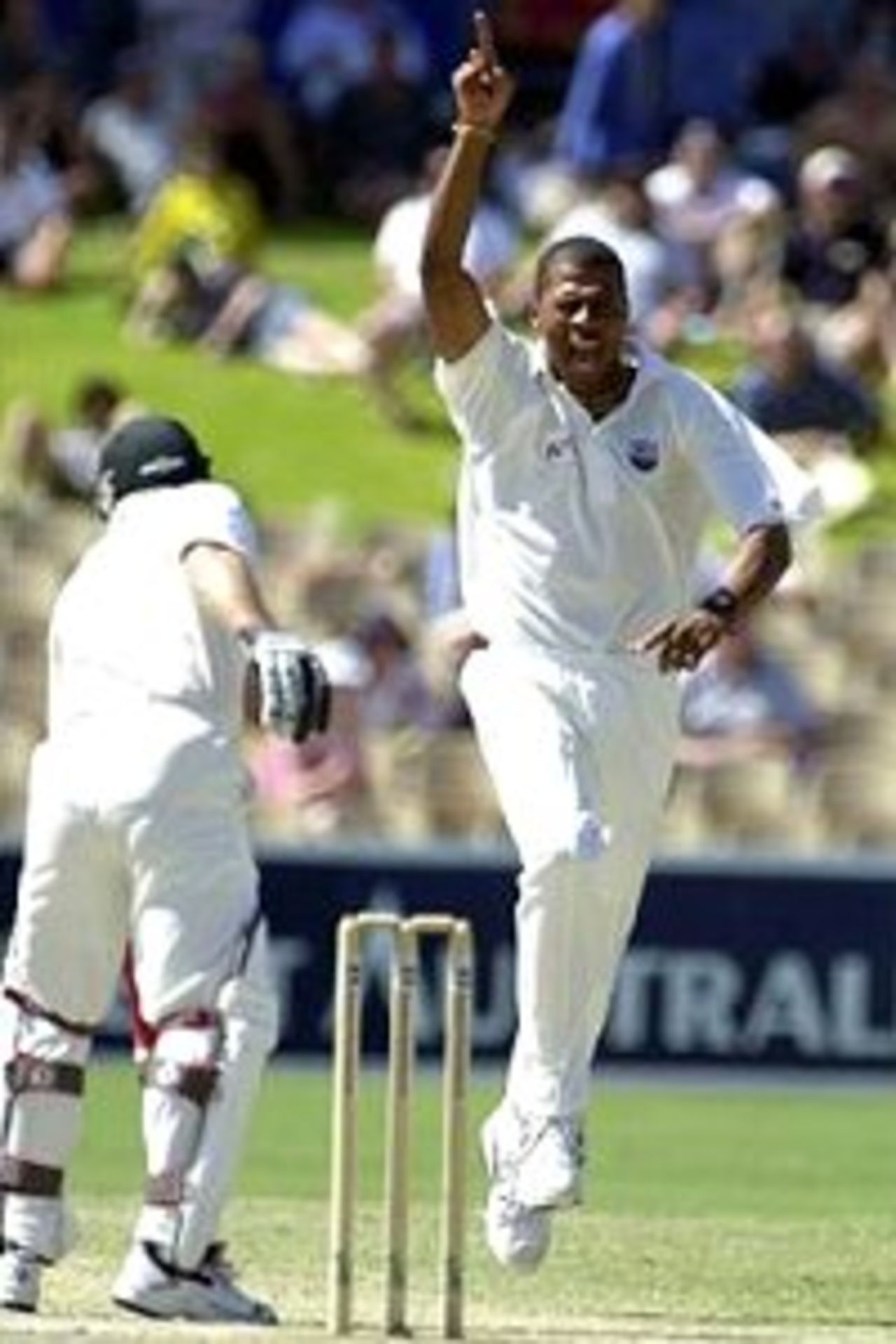 Mervyn Dillon of West Indies celebrates the wicket of Michael Slater of Australia caught by Ridley Jacobs for one during the fourth days play of the Third Test match between Australia and West Indies at the Adelaide Oval in Adelaide, Australia.