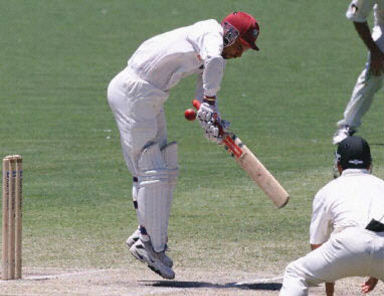 West Indies batsman and captain Jimmy Adams bounces on his toes after being hit by a delivery from Australian bowler Jason Gillespie on day four of the third Test match at the Adelaide Oval, 18 December 2000. Adams was dismissed for three runs in the West Indies second innings, with Australia now only needing to score 32 runs 19 December to win the match with six wickets in hand.