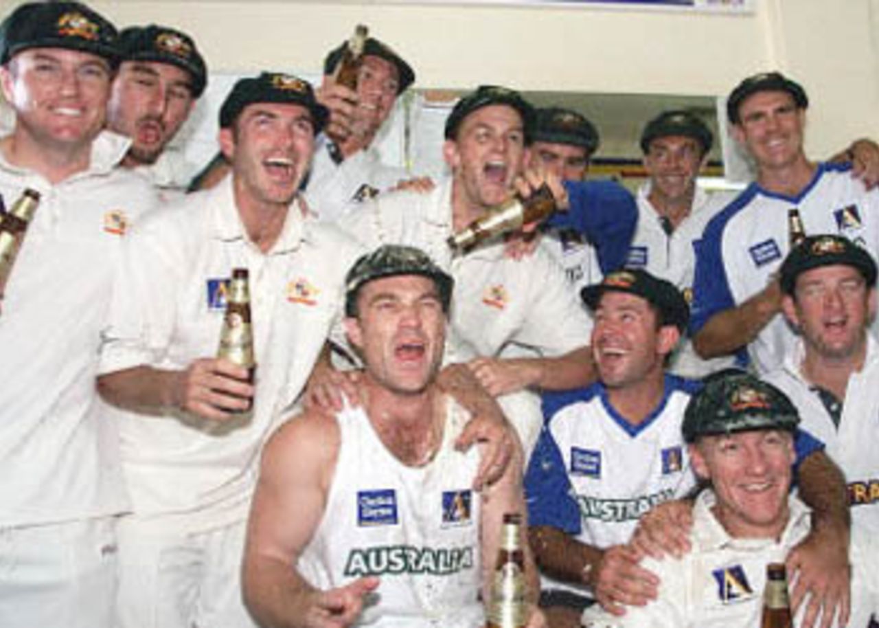 The Australian test cricket side celebrate their five wicket win over the West Indies, in the third test at the Adelaide Oval, 19 December 2000. The win is the first for stand in captain Adam Gilchrist who replaced the injured Steve Waugh for this match, and extends Australia's world record unbeaten run to 13.