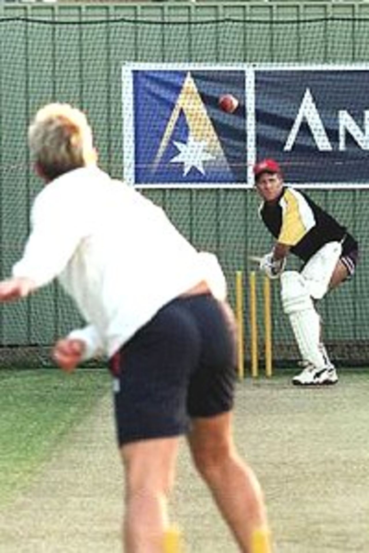 2 Dec 2000: Former Australian wicketkeeper Ian Healy returns to the nets for practice and is bowled to by Shane Warne ahead of the Ian Healy Testimonial game later in December after the second days play of the Second Test match between Australia and West Indies at the WACA Cricket Ground, Perth, Australia.