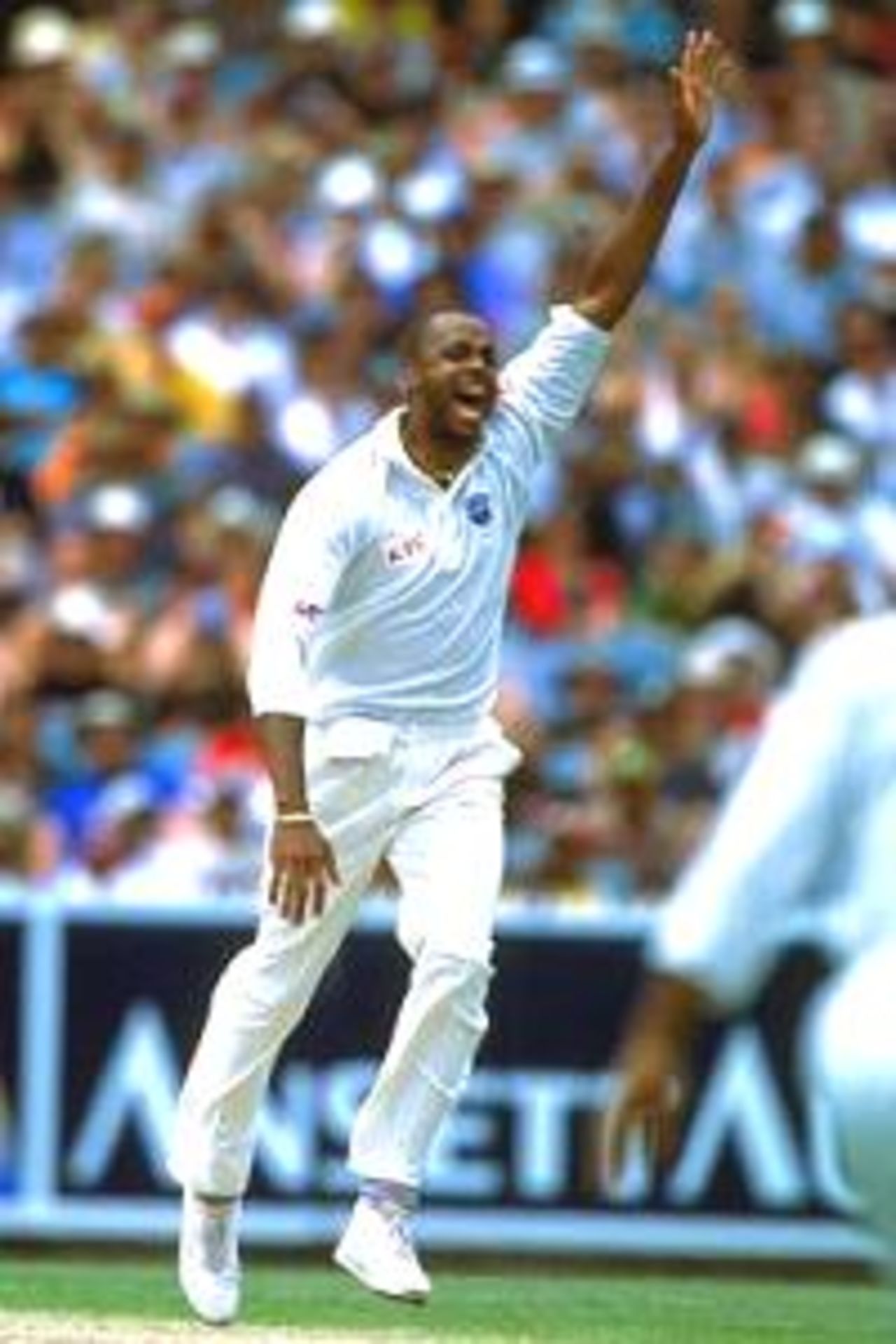26 Dec 2000: Courtney Walsh of the West Indies celebrates taking the wicket of Matthew Hayden of Australia, in the 4th test match between Australia and the West Indies, played at the Melbourne Cricket Ground in Melbourne, Australia.