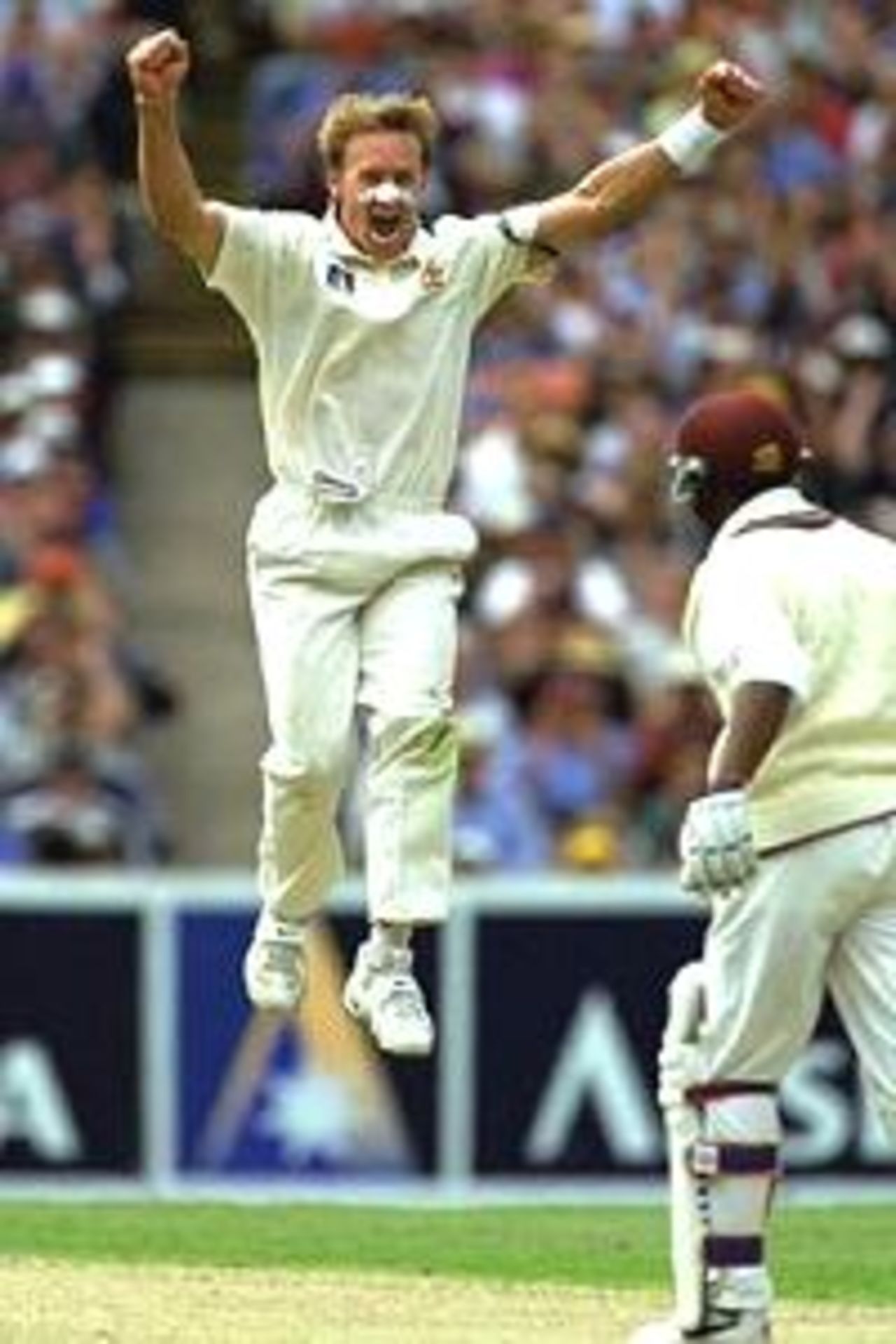 27 Dec 2000: Andy Bichel of Australia celebrates taking the wicket of Brian Lara for 16, in the 4th test match between Australia and the West Indies, played at the Melbourne Cricket Ground in Melbourne, Australia.
