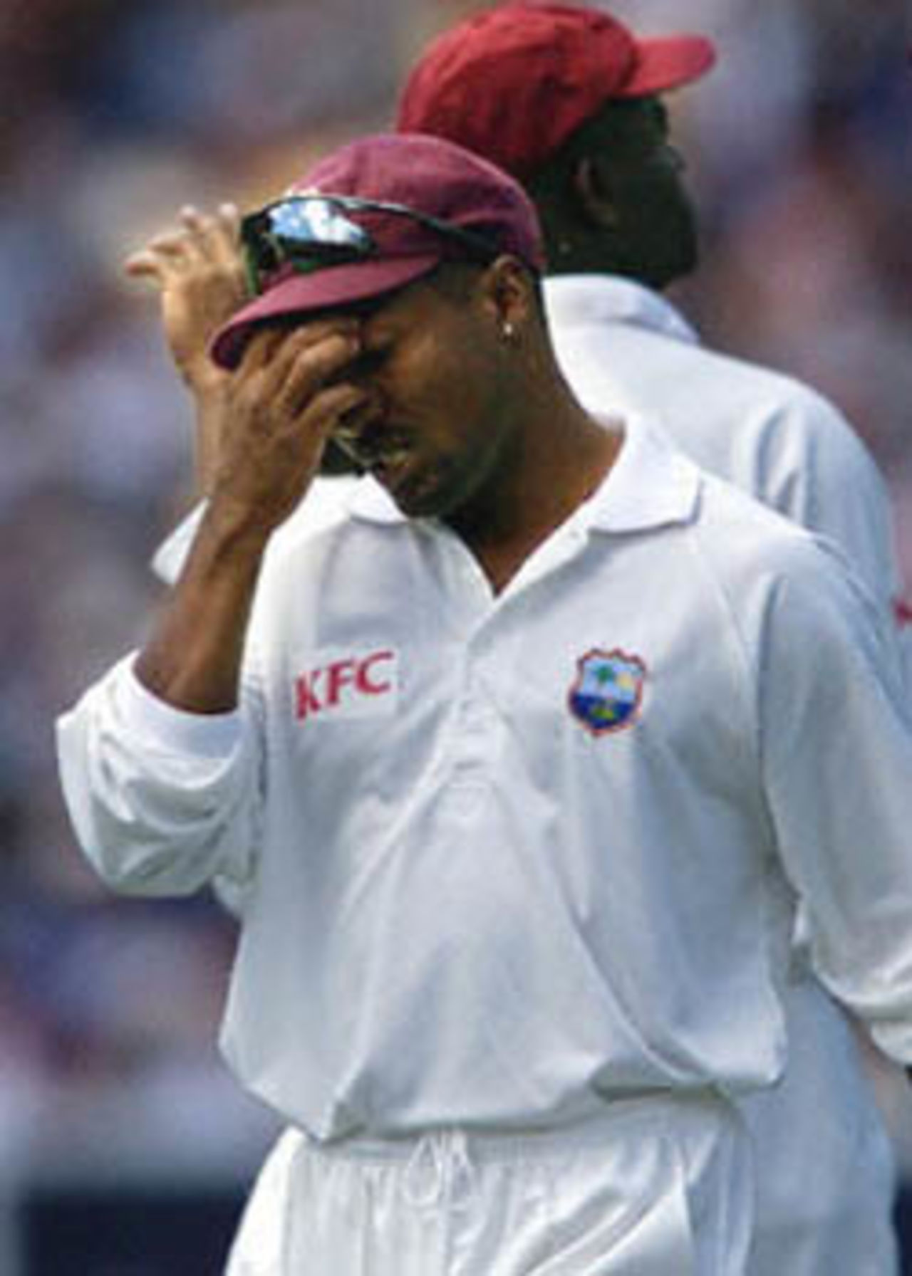 West Indian fieldsman Brian Lara looks dejected after his teammates dropped Australian opener Michael Slater on the first day of the fourth Test Match at the MCG in Melbourne 26 December 2000. At lunch Australia is 77-2 with Mark Waugh and Justin Langer the two not out batsmen.