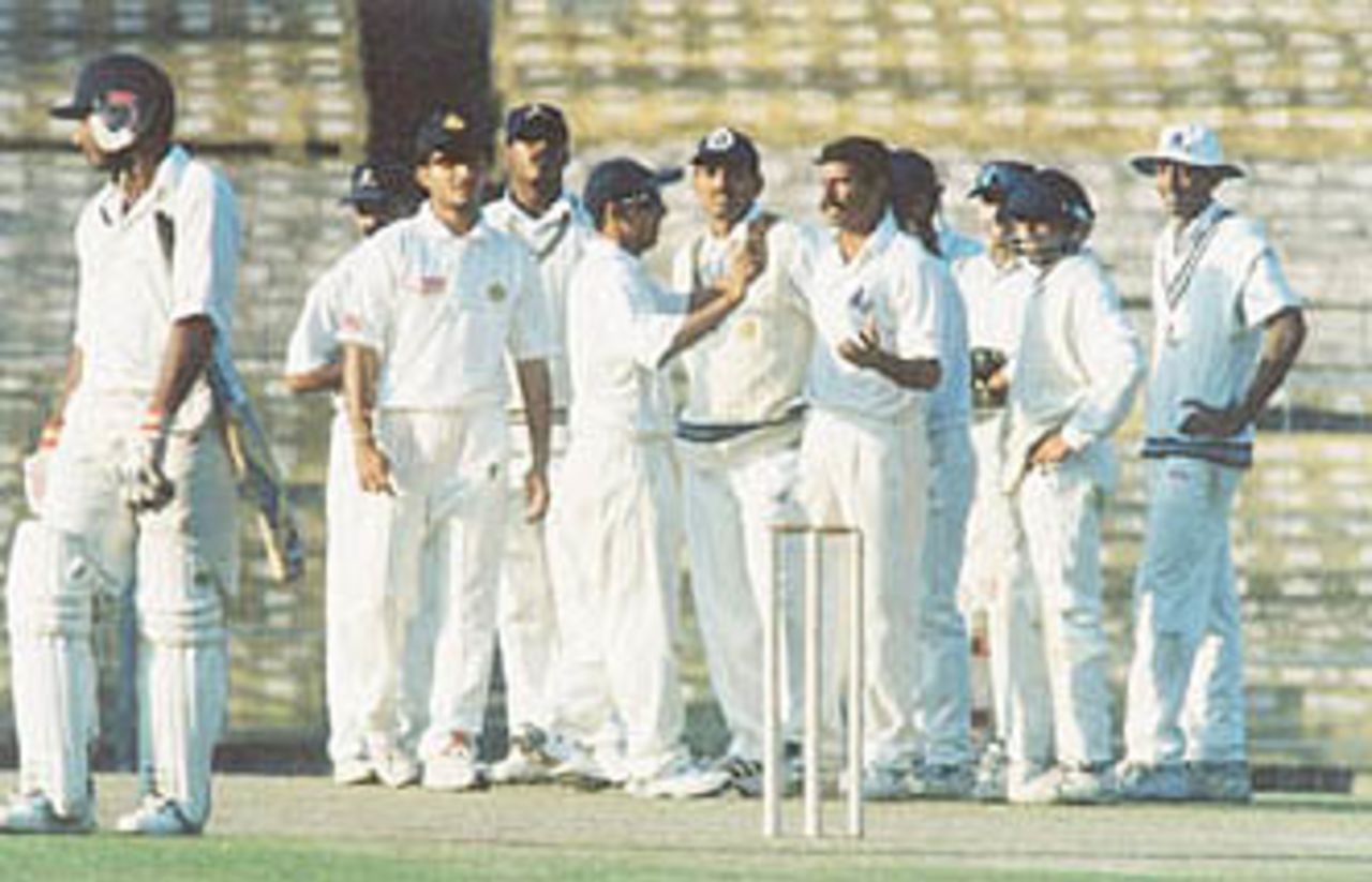 Bengal celebrates the fall of an Orissa wicket. Ranji Trophy East Zone League, 2000-01, Bengal v Orissa, Eden Gardens, Calcutta, 28-31 December 2000 (Day 2).
