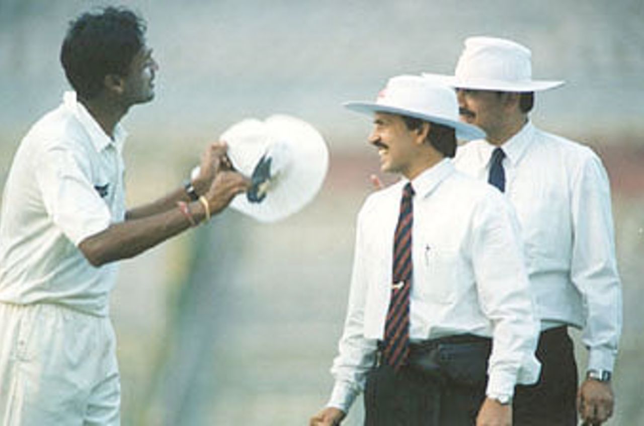 Mohanty receives the hat from the Umpire. Ranji Trophy East Zone League, 2000-01, Bengal v Orissa, Eden Gardens, Calcutta, 28-31 December 2000 (Day 3).