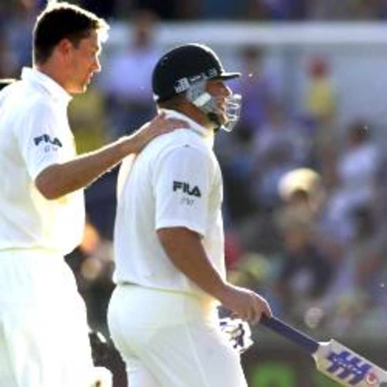 2 Dec 2001: A dejected Shane Warne of Australia is consoled by team mate Glenn McGrath, after being caught by Mark Richardson of New Zealand for 99 off the bowling of Daniel Vettori, during day three of the Third Test between Australia and New Zealand, played at The WACA, Perth, Australia.