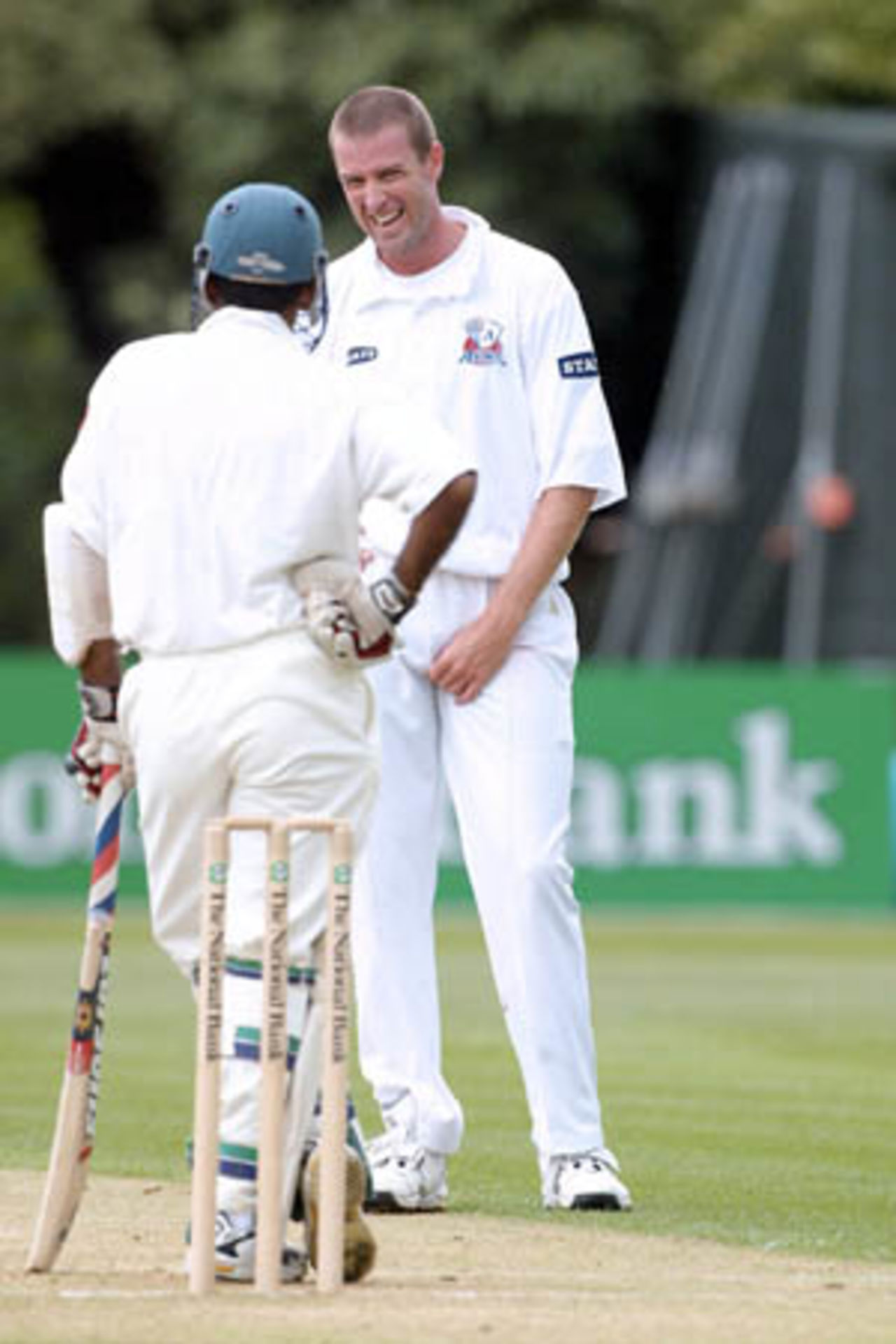 Auckland bowler Chris Drum has a few words with Bangladeshi batsman Habibul Bashar. Tour match: Auckland v Bangladeshis at Eden Park Outer Oval, Auckland, 12-15 Dec 2001 (12 December 2001).