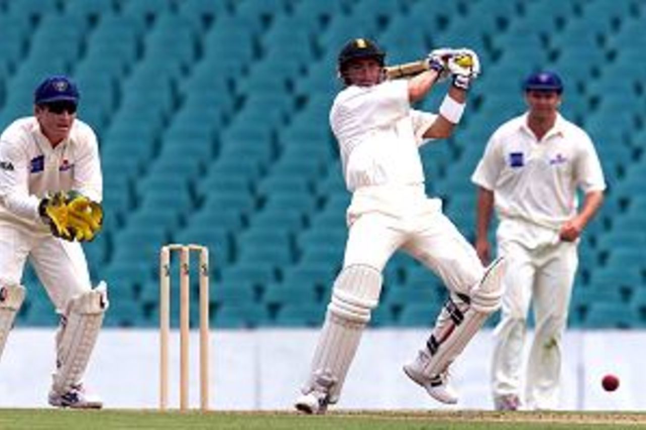 20 Dec 2001: Hershelle Gibbs of South Africa hits a boundary during day one of the New South Wales v South Africa tour match played at the Sydney Cricket Ground in Sydney, Australia.