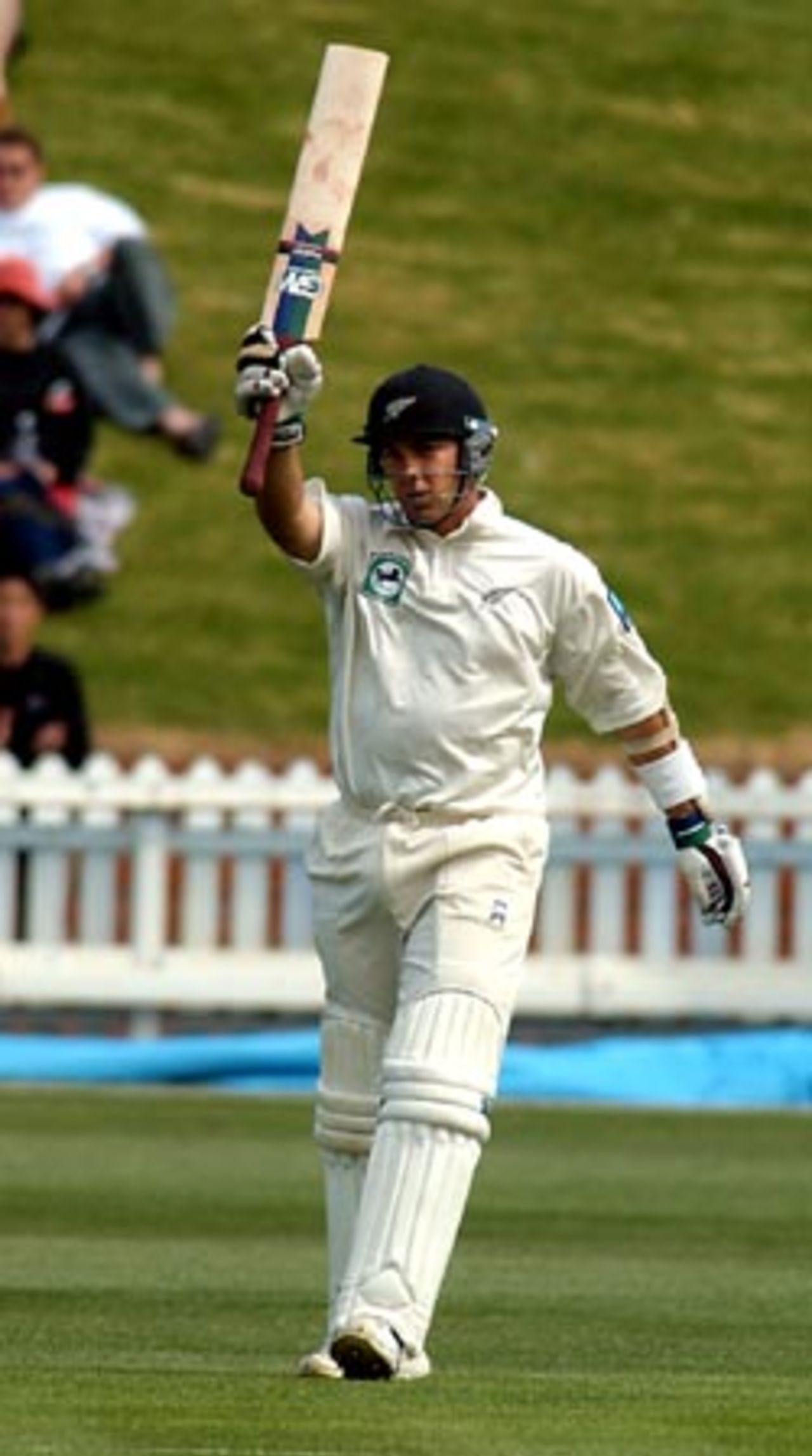 New Zealand batsman Craig McMillan raises his bat upon reaching his 50. McMillan went on to score 70 in his first innings. 2nd Test: New Zealand v Bangladesh at Basin Reserve, Wellington, 26-30 Dec 2001 (29 December 2001).