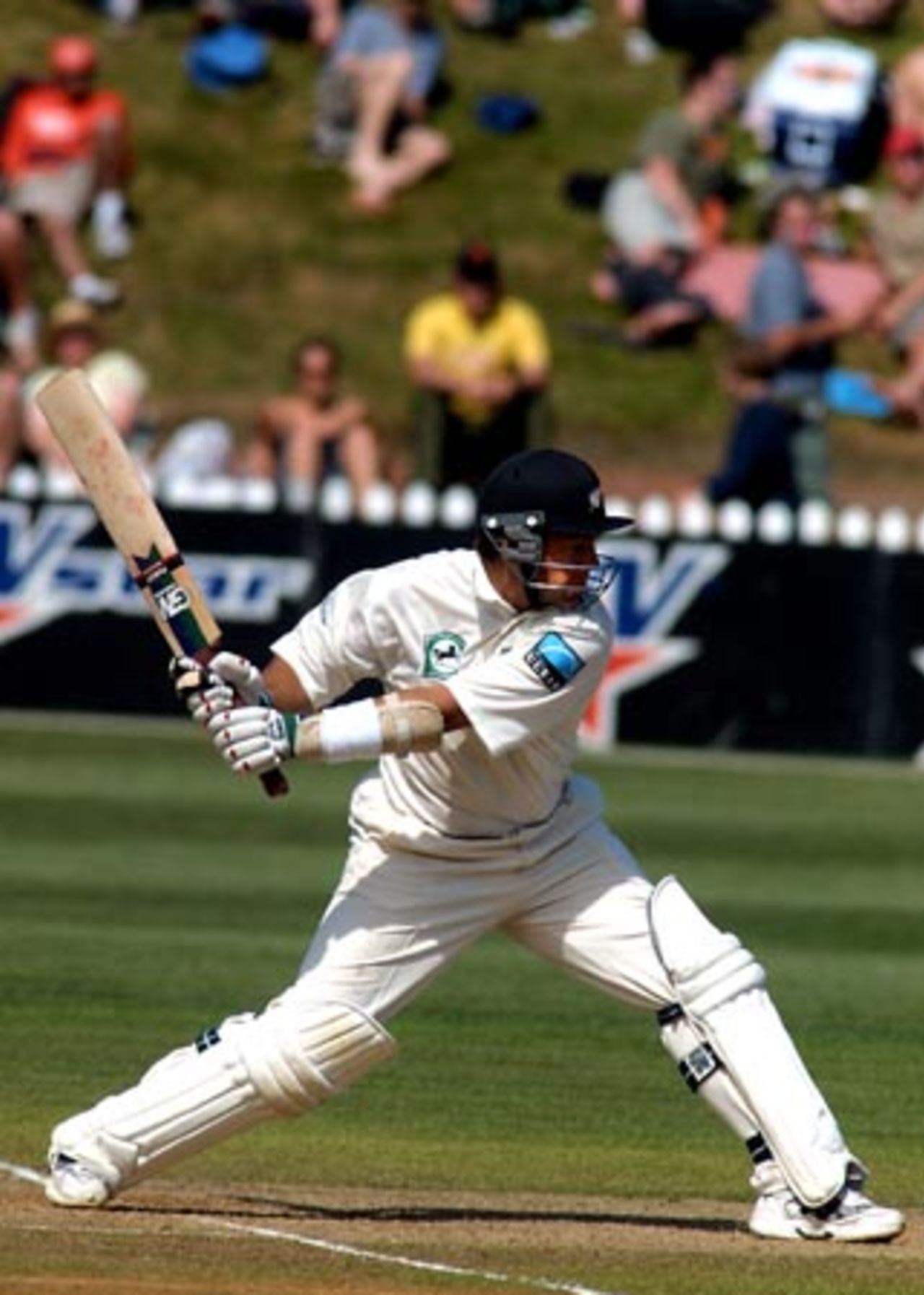 New Zealand batsman Craig McMillan at full stretch about to drive a delivery during his first innings of 70. 2nd Test: New Zealand v Bangladesh at Basin Reserve, Wellington, 26-30 Dec 2001 (29 December 2001).