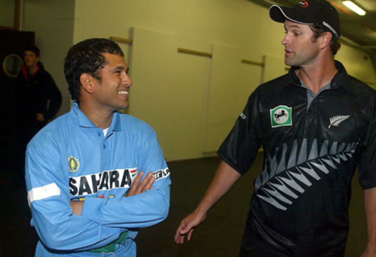 Indian player Sachin Tendulkar and New Zealand captain Chris Cairns share a laugh in the players' tunnel at the end of the match. Super Max International: New Zealand v India at Jade Stadium, Christchurch, 4 December 2002.