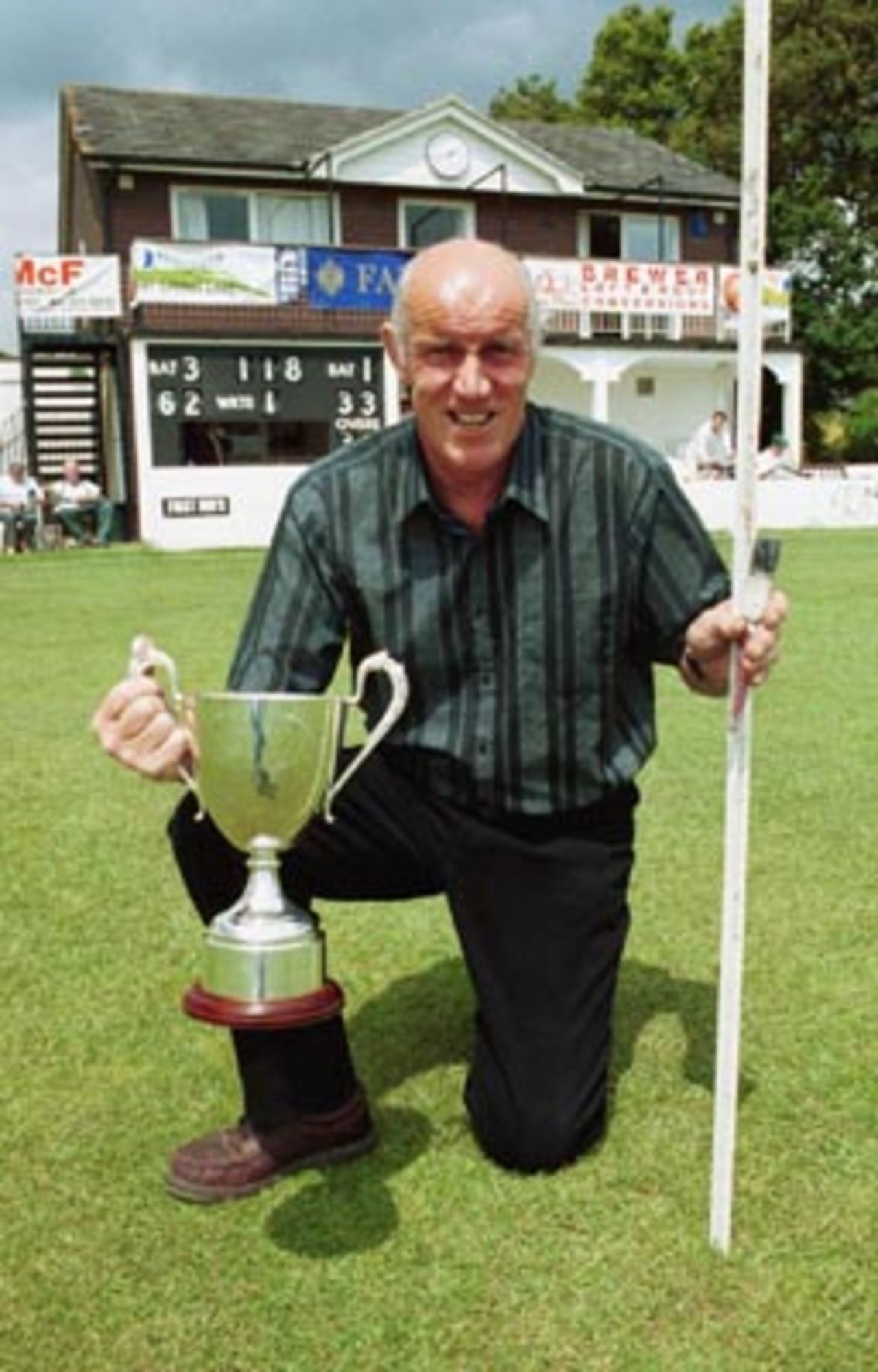 Chris Plummer, Head Groundsman at Bashley Rydal CC, with his Groundsman of the year award.
