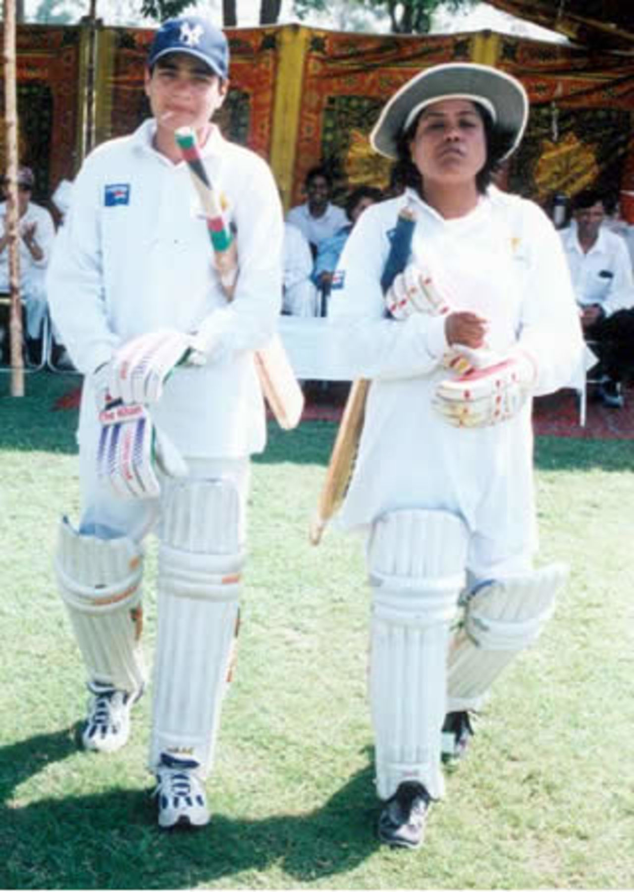 Punjab Greens Women Team openers head out against Sindh Women, National QEA Women Cricket Trophy 2002 at Race Course Park, 30 Sept to 5 Oct 2002