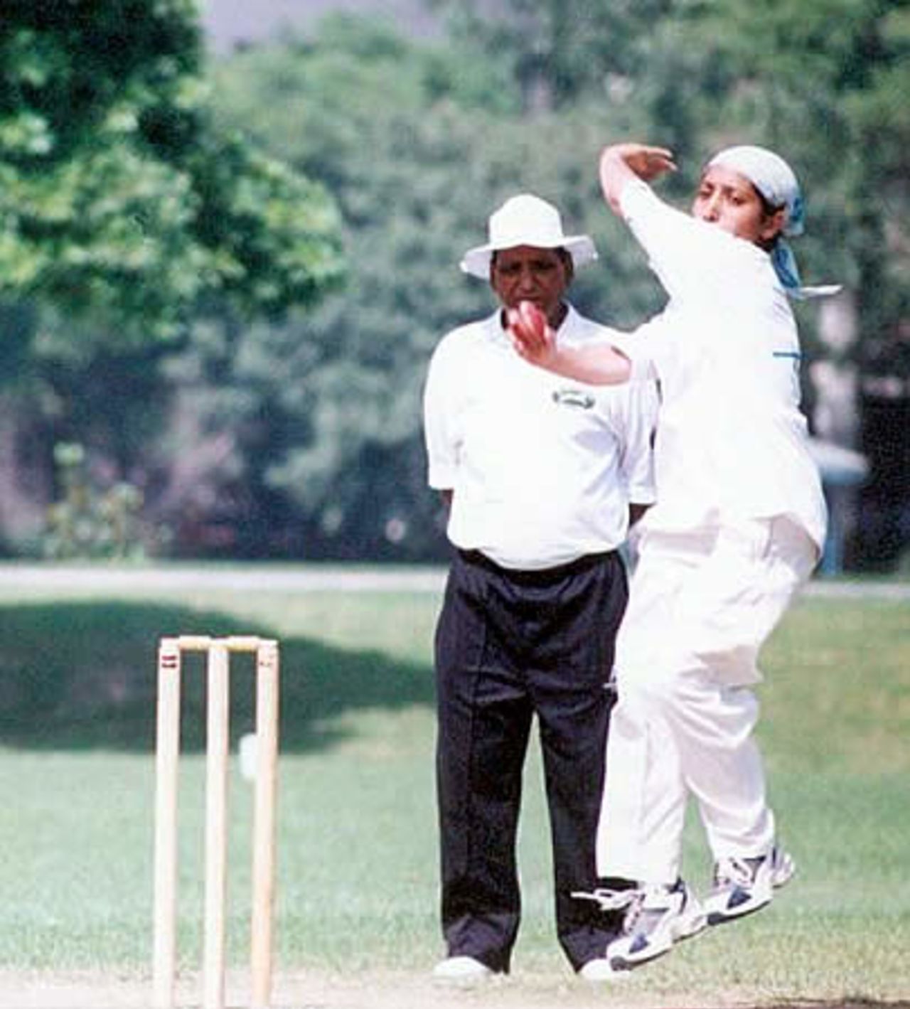 NWFP Women Team fast bowler in action aginst Sindh Women, National QEA Women Cricket Trophy 2002 at Race Course Park, 30 Sept to 5 Oct 2002