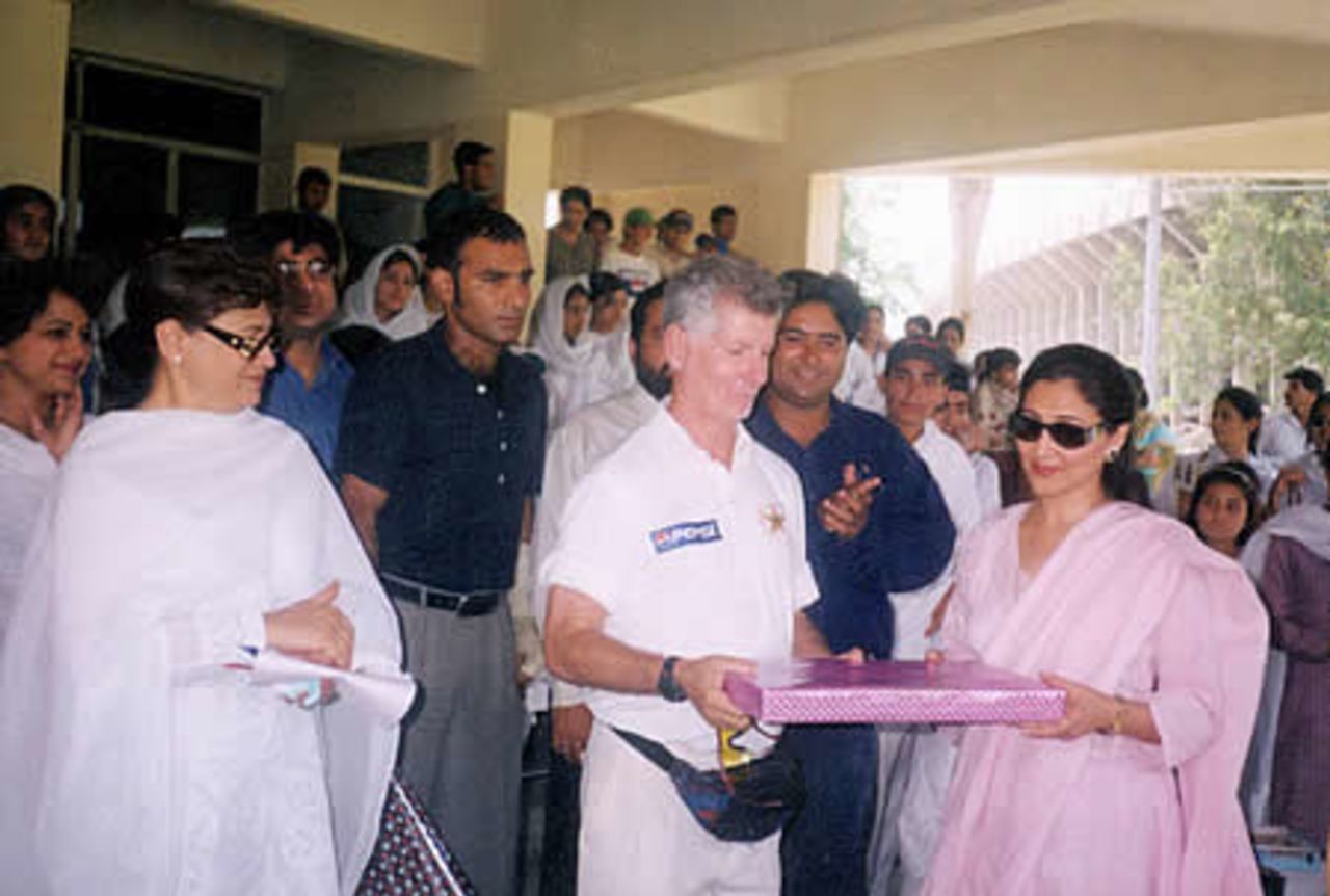 Dan Keisel (Physio Pakistan team) receiving a prize from Neelam Shahid, LCCA Ground, Lahore