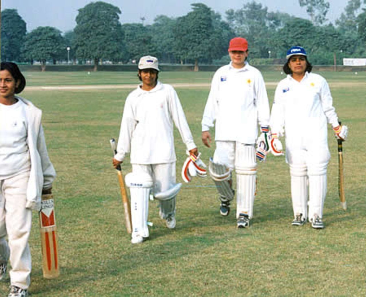 Raeesa Ilyas (captain) and Taskeen Qadir (with runner) the not out pair, NQWCT-2000, 20-25 Nov 2000, Race Course Park, Lahore