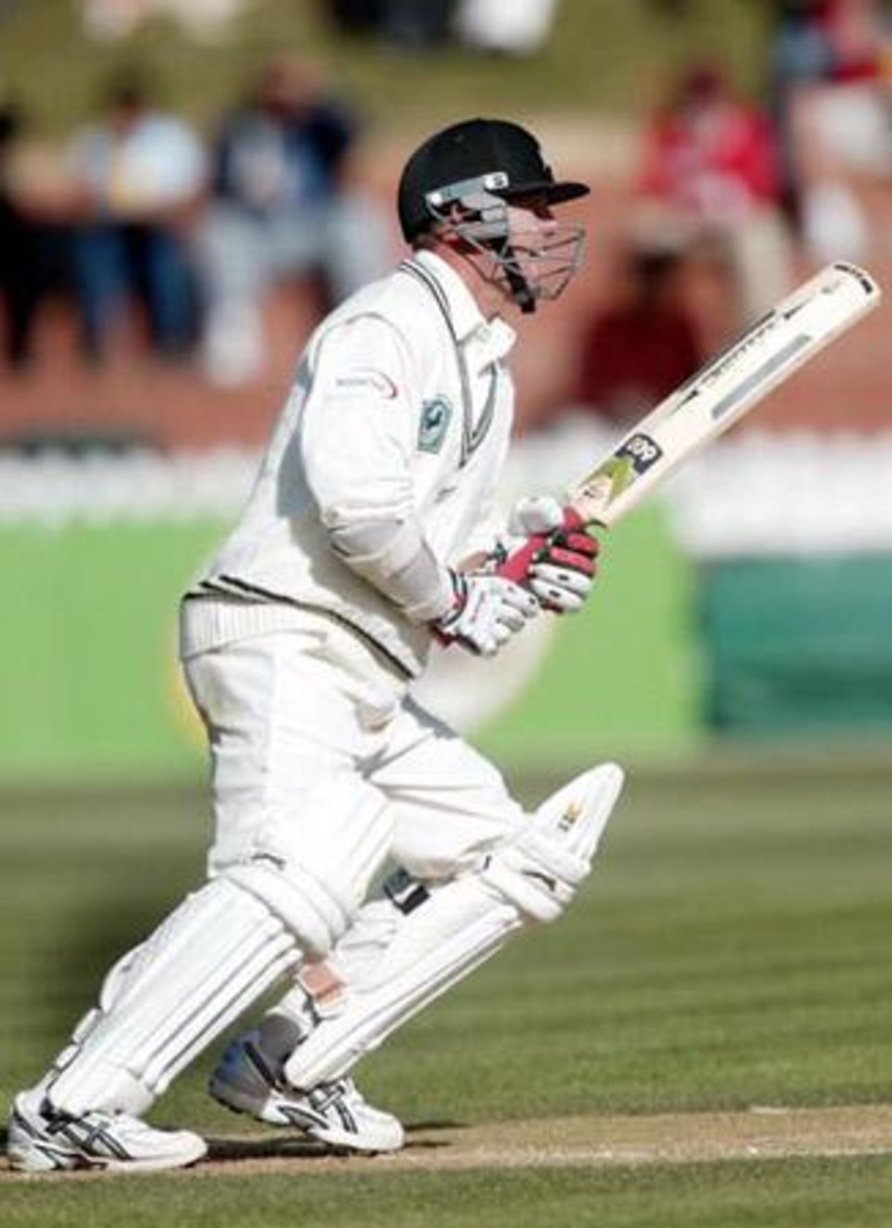New Zealand batsman Mark Richardson plays a delivery down the ground during his first innings of 83 not out on the second day. 1st Test: New Zealand v India at Basin Reserve, Wellington, 12-16 December 2002 (13 December 2002).