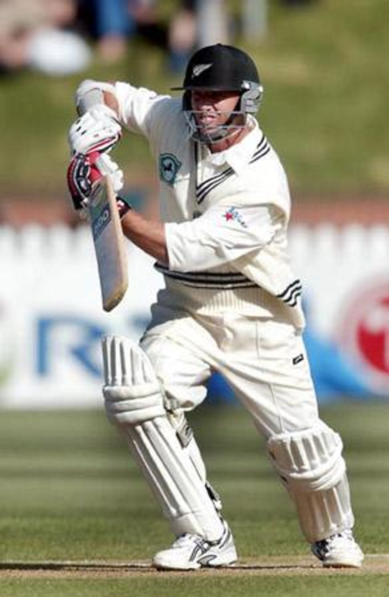 New Zealand batsman Mark Richardson pushes a delivery up towards mid off during his first innings of 83 not out on the second day. 1st Test: New Zealand v India at Basin Reserve, Wellington, 12-16 December 2002 (13 December 2002).
