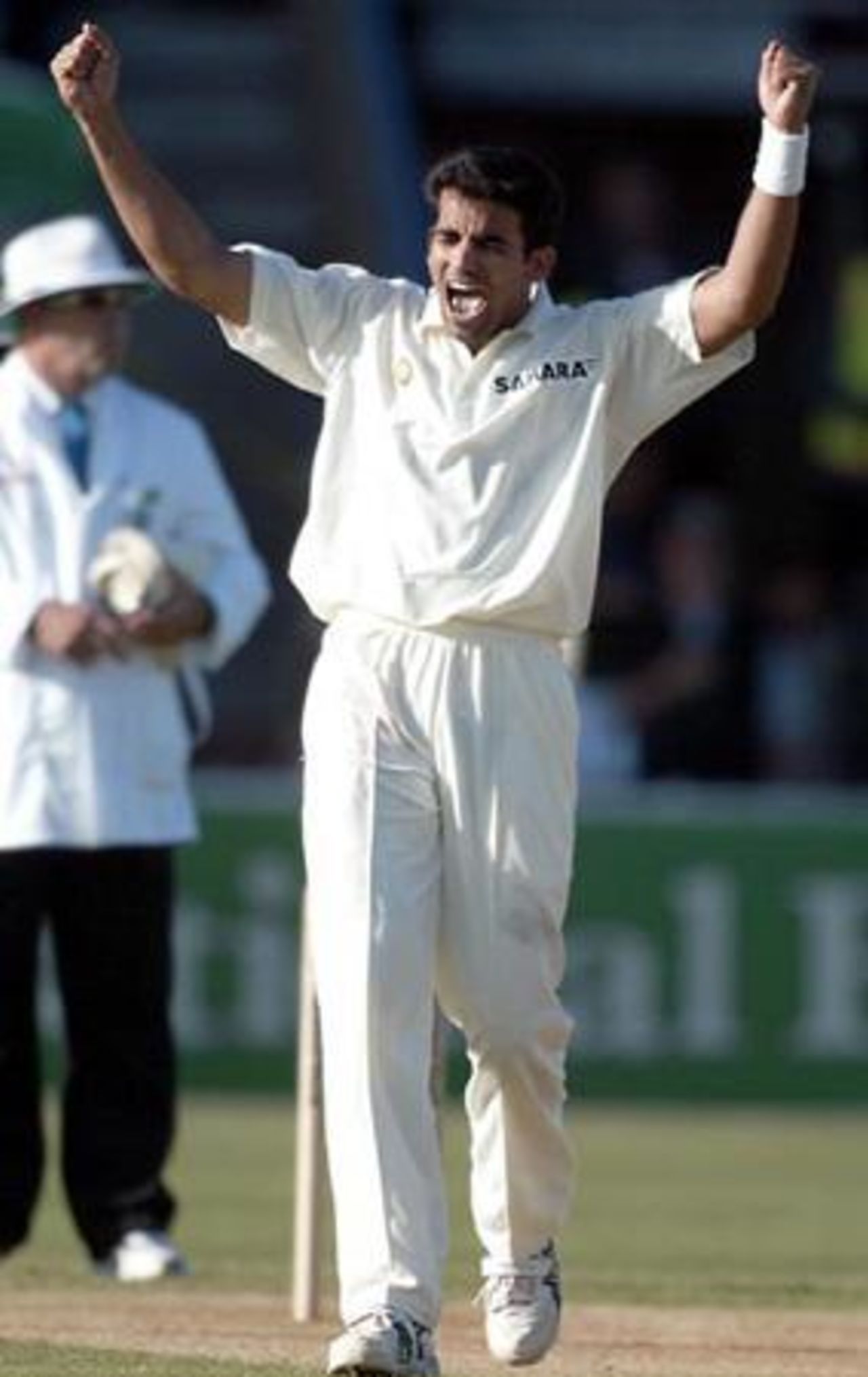 Indian bowler Zaheer Khan celebrates the dismissal of New Zealand batsman Nathan Astle, caught by Harbhajan Singh for 41 in his first innings. 1st Test: New Zealand v India at Basin Reserve, Wellington, 12-16 December 2002 (13 December 2002).