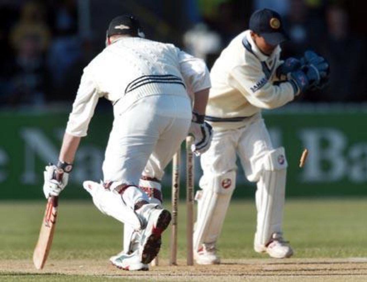 New Zealand batsman Scott Styris fails to get back into his crease in time and is stumped by Indian wicket-keeper Patel, off the bowling of Harbhajan Singh for 0. 1st Test: New Zealand v India at Basin Reserve, Wellington, 12-16 December 2002 (13 December 2002).