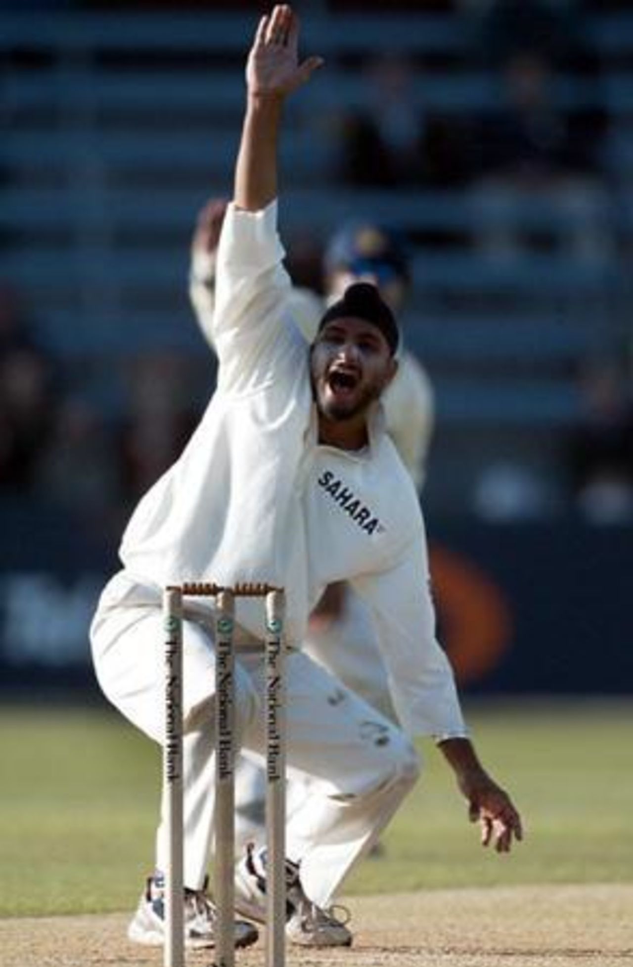 Indian bowler Harbhajan Singh unsuccessfully appeals for lbw against New Zealand batsman Jacob Oram during his spell of 2-22 from 13 overs on the second day. 1st Test: New Zealand v India at Basin Reserve, Wellington, 12-16 December 2002 (13 December 2002).