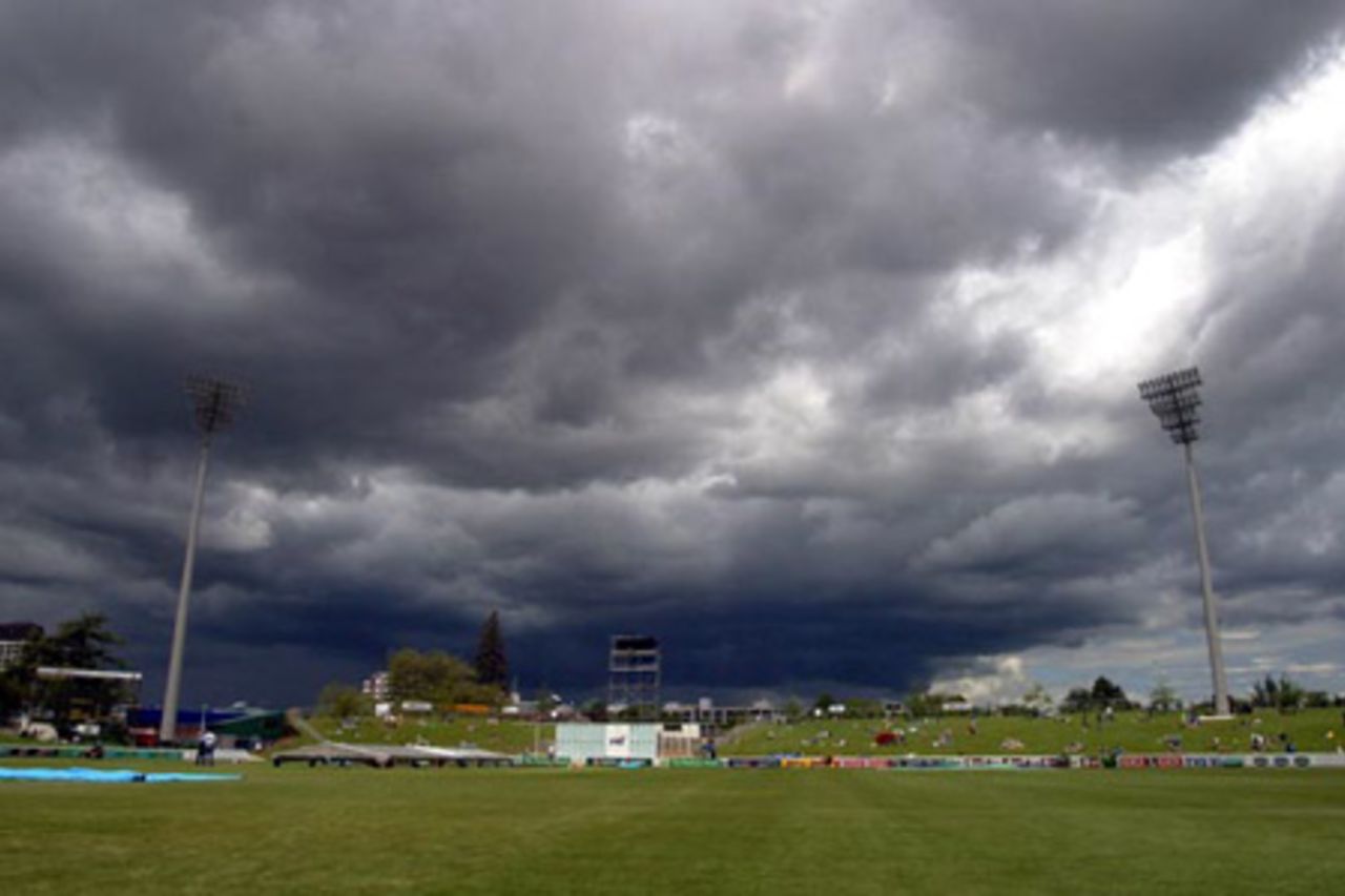 Dark cloud hovers over the ground as the covers are about to be brought on. Play was eventually abandoned on day one at 2.45pm. 2nd Test: New Zealand v India at Westpac Park, Hamilton, 19-23 December 2002 (19 December 2002).