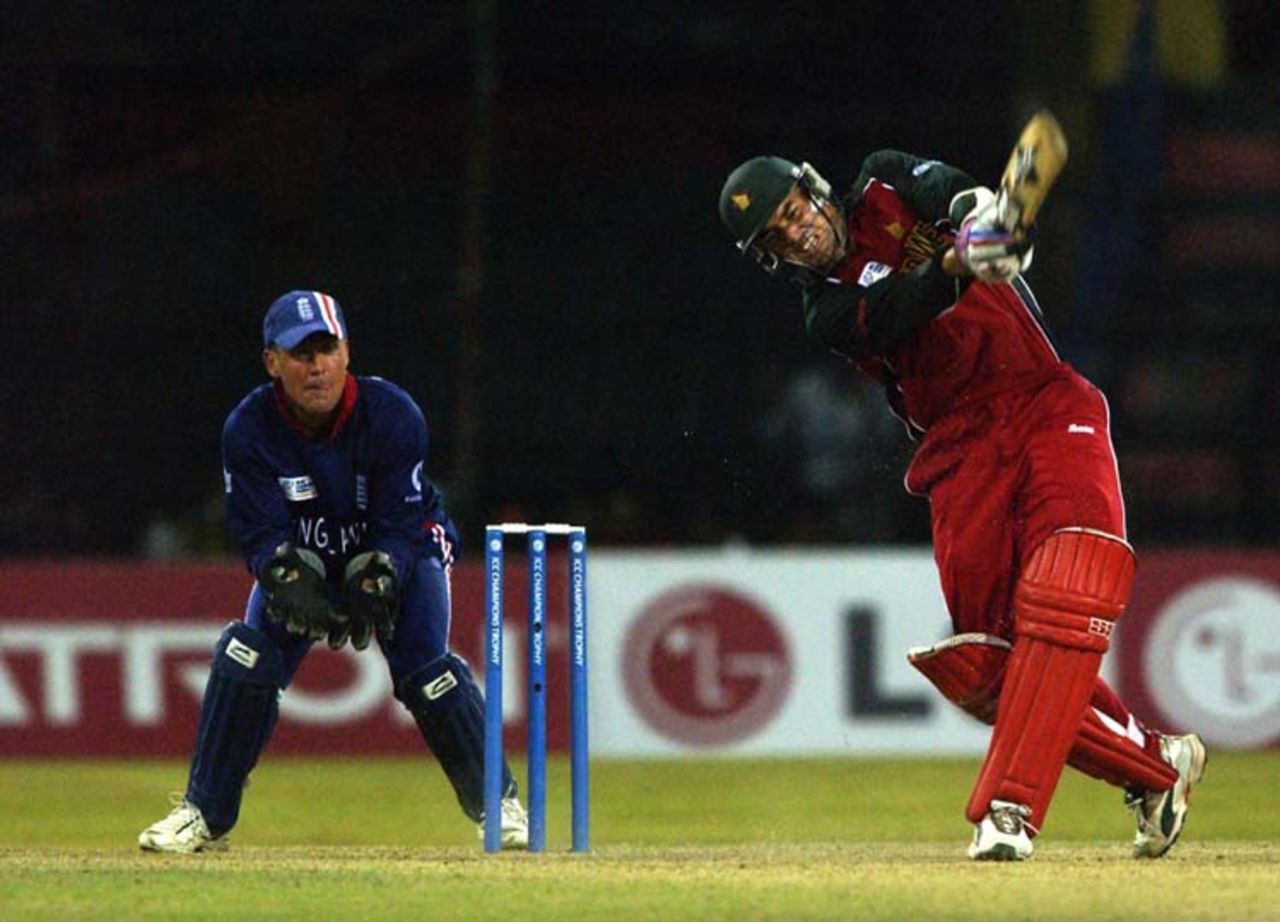 Heath Streak of Zimbabwe hits out during the ICC Champions Trophy match between England and Zimbabwe on September 18, 2002 played at the R. Premadasa Stadium in Colombo, Sri Lanka.