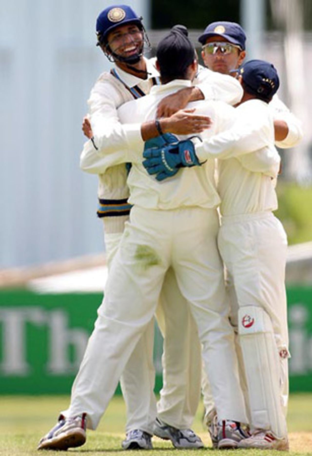 Members of the Indian team celebrate the dismissal of New Zealand batsman Scott Styris, lbw to Harbhajan Singh for 13 in his first innings. From left: VVS Laxman, Harbhajan, Rahul Dravid and Parthiv Patel (facing away). 2nd Test: New Zealand v India at Westpac Park, Hamilton, 19-23 December 2002 (21 December 2002).