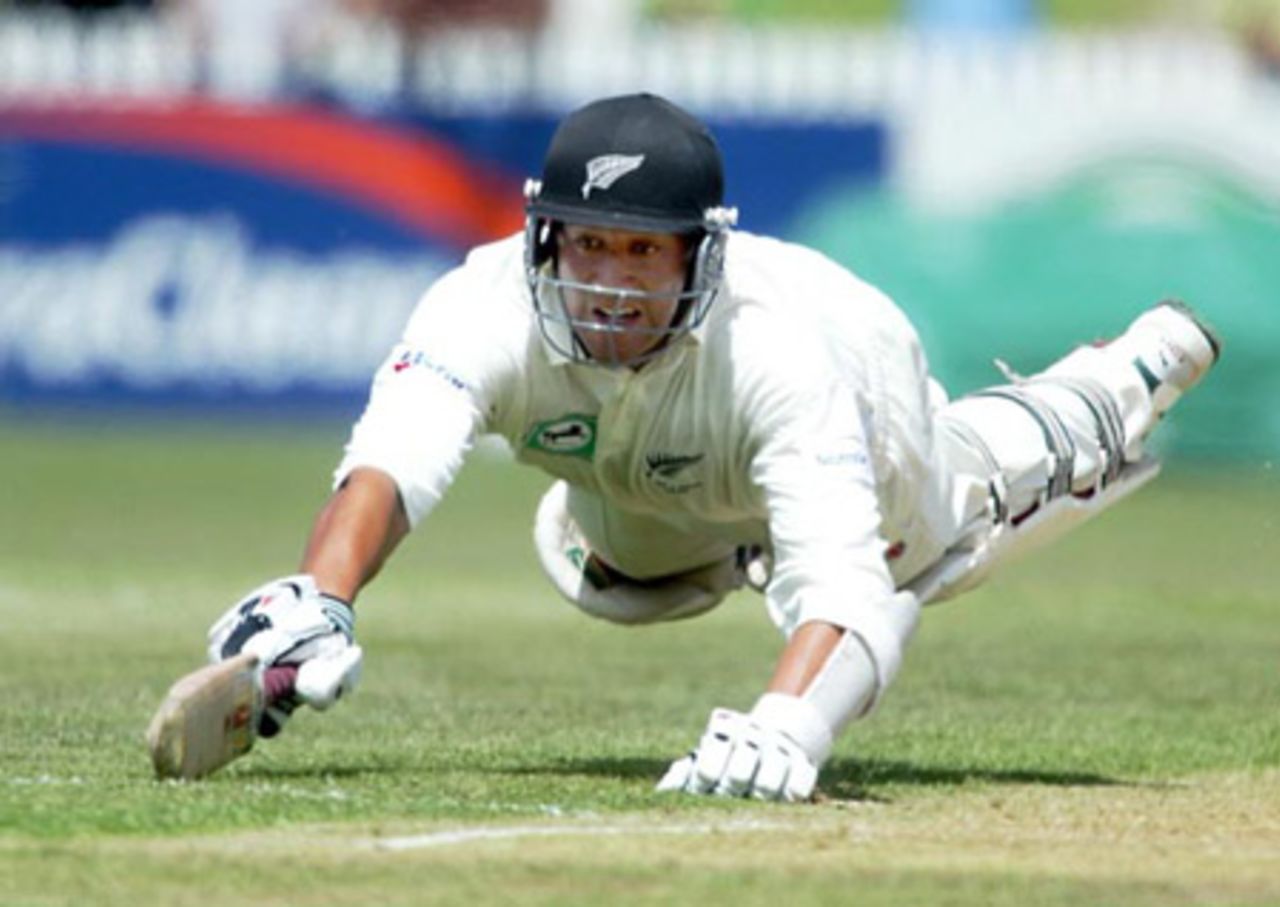 New Zealand batsman Daryl Tuffey dives back into his crease but is run out by Indian fielder Zaheer Khan for 13 in his first innings. 2nd Test: New Zealand v India at Westpac Park, Hamilton, 19-23 December 2002 (21 December 2002).