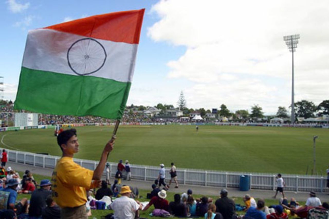 An Indian fan waves his flag as he follows the match. 2nd Test: New Zealand v India at Westpac Park, Hamilton, 19-23 December 2002 (21 December 2002).