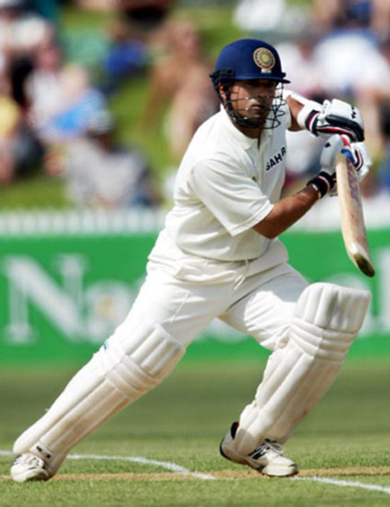 Indian batsman Sachin Tendulkar drives a delivery through the covers during his second innings of 32. 2nd Test: New Zealand v India at Westpac Park, Hamilton, 19-23 December 2002 (21 December 2002).