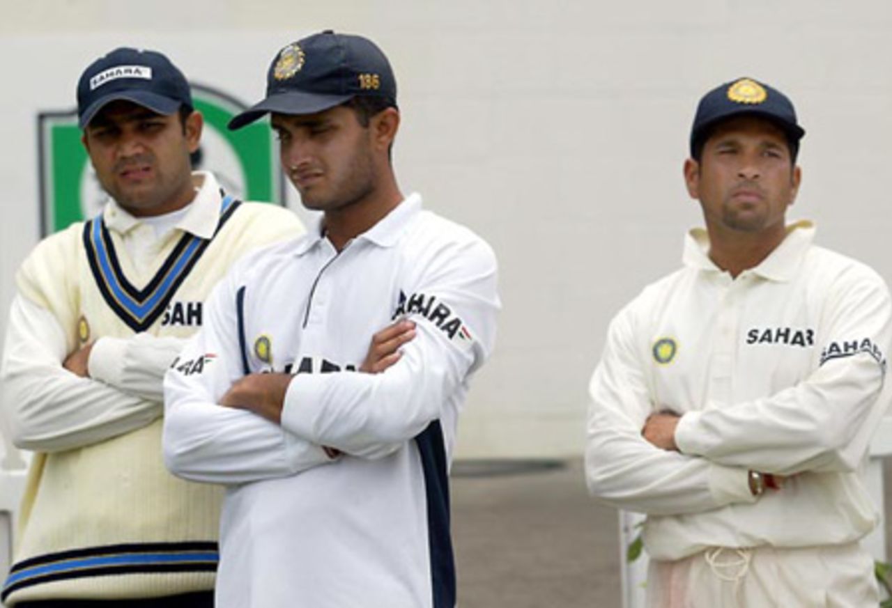 Indian players Virender Sehwag (left), Sourav Ganguly and Sachin Tendulkar look disappointed at the end of match presentation ceremony after India lost the second Test by four wickets and the two-Test series 2-0. 2nd Test: New Zealand v India at Westpac Park, Hamilton, 19-23 December 2002 (22 December 2002).