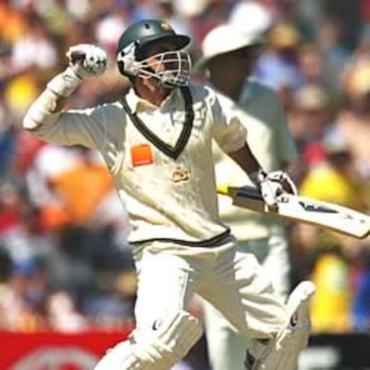 MELBOURNE - DECEMBER 26: Justin Langer of Australia reaches 100 runs during the first day of the Boxing Day Fourth Ashes Test between Australia and England at the Melbourne Cricket Ground in Melbourne, Australia on December 26, 2002.